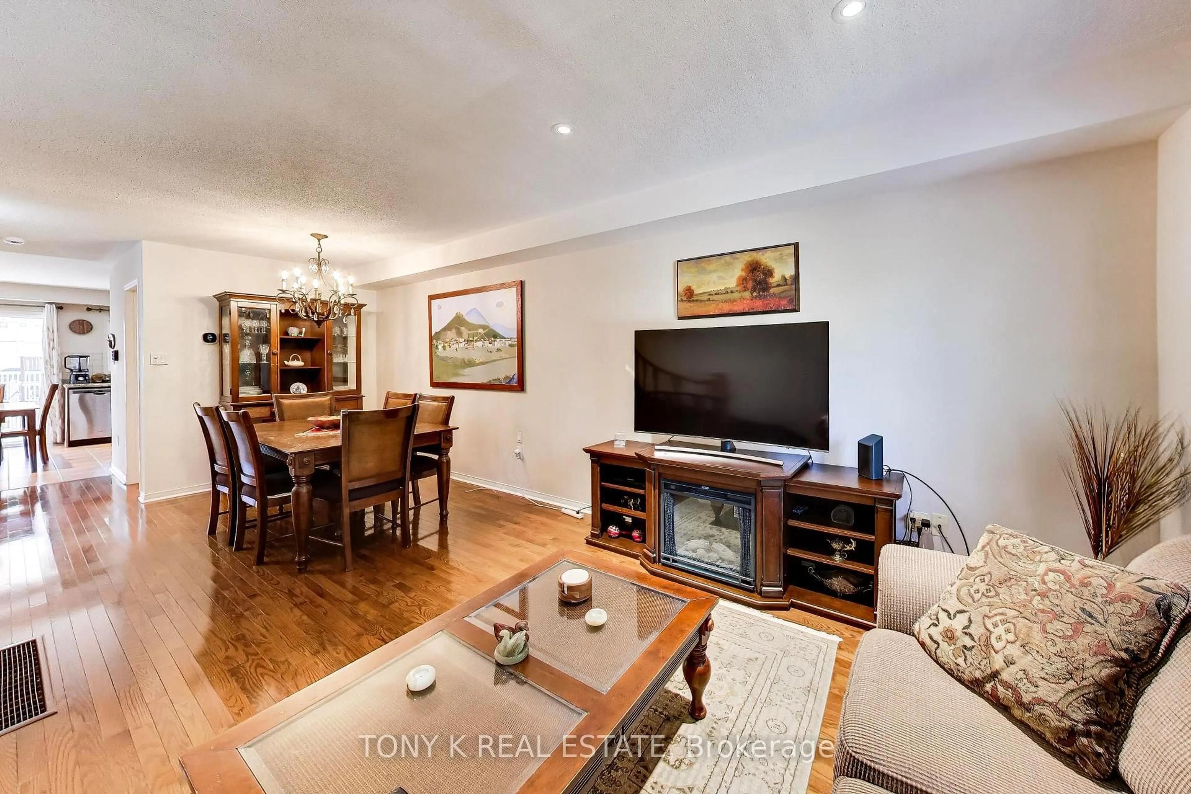 Living room with furniture, wood/laminate floor for 45 Weston Rd, Toronto Ontario M6N 5H3