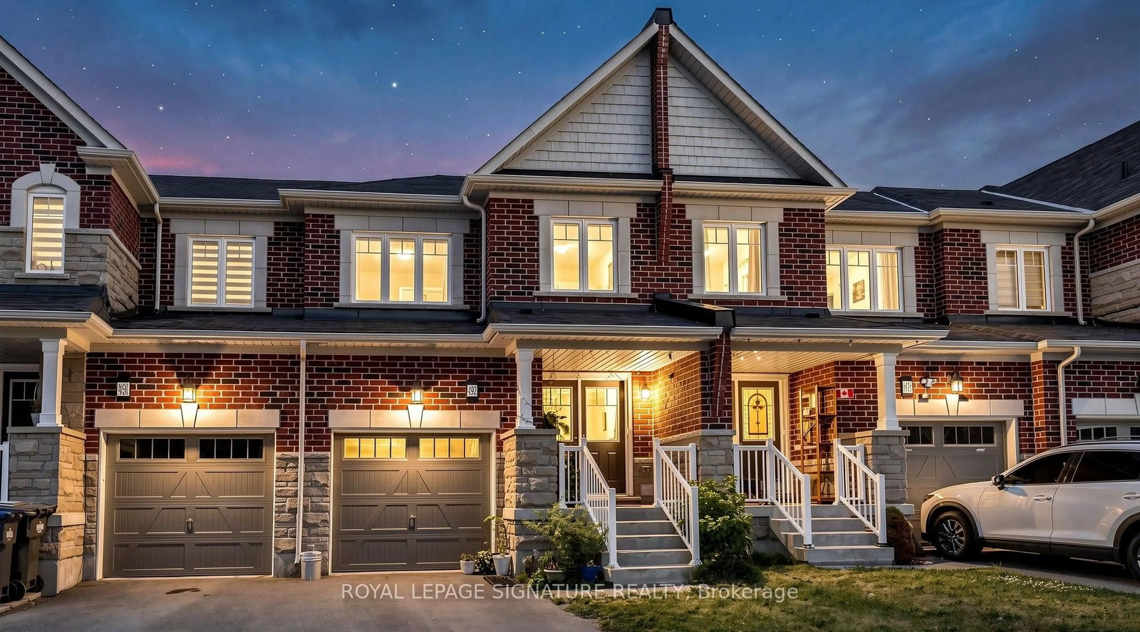 Home with brick exterior material, street for 492 Queen Mary Dr, Brampton Ontario L7A 0C7