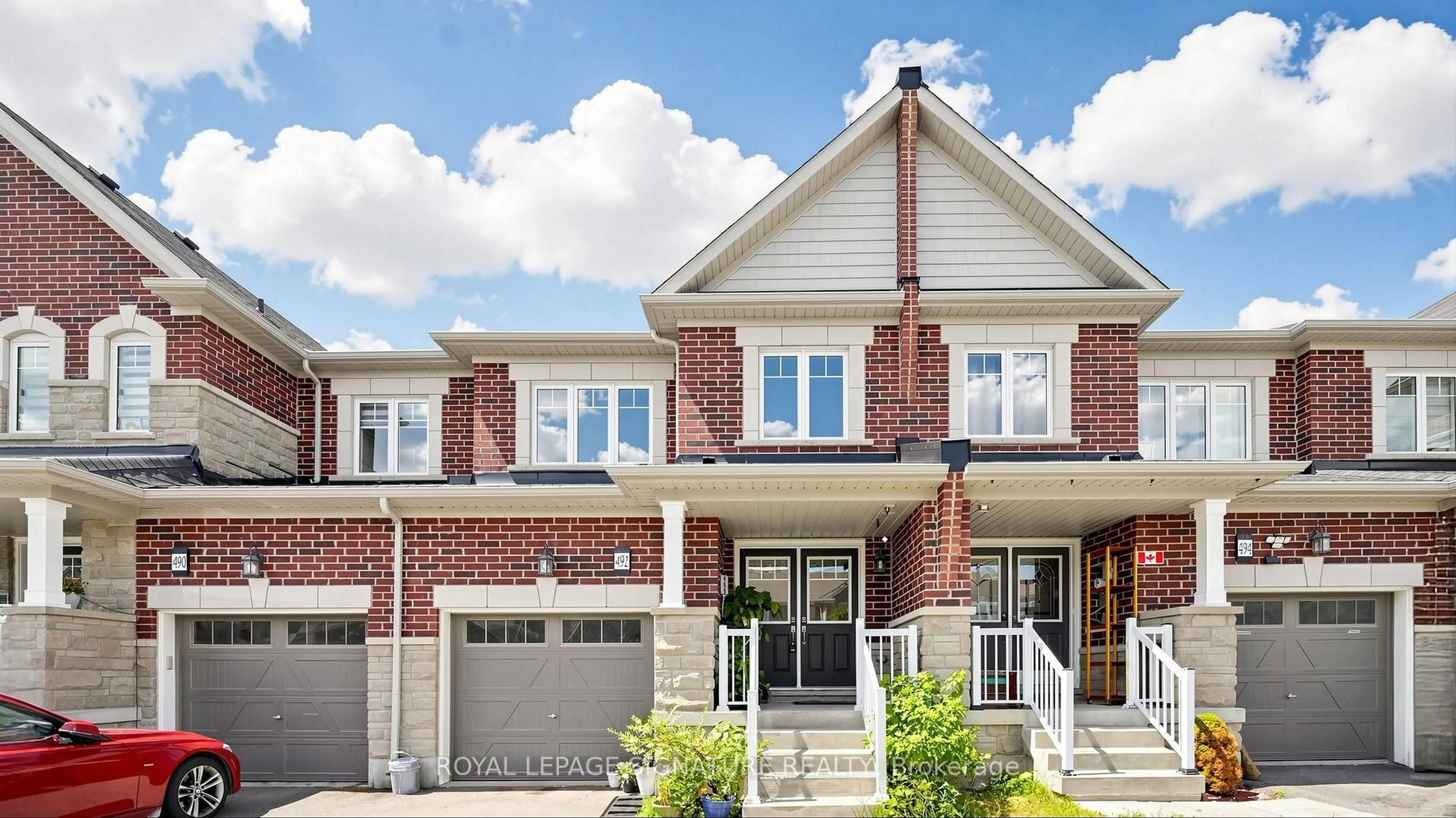 Home with brick exterior material, street for 492 Queen Mary Dr, Brampton Ontario L7A 0C7