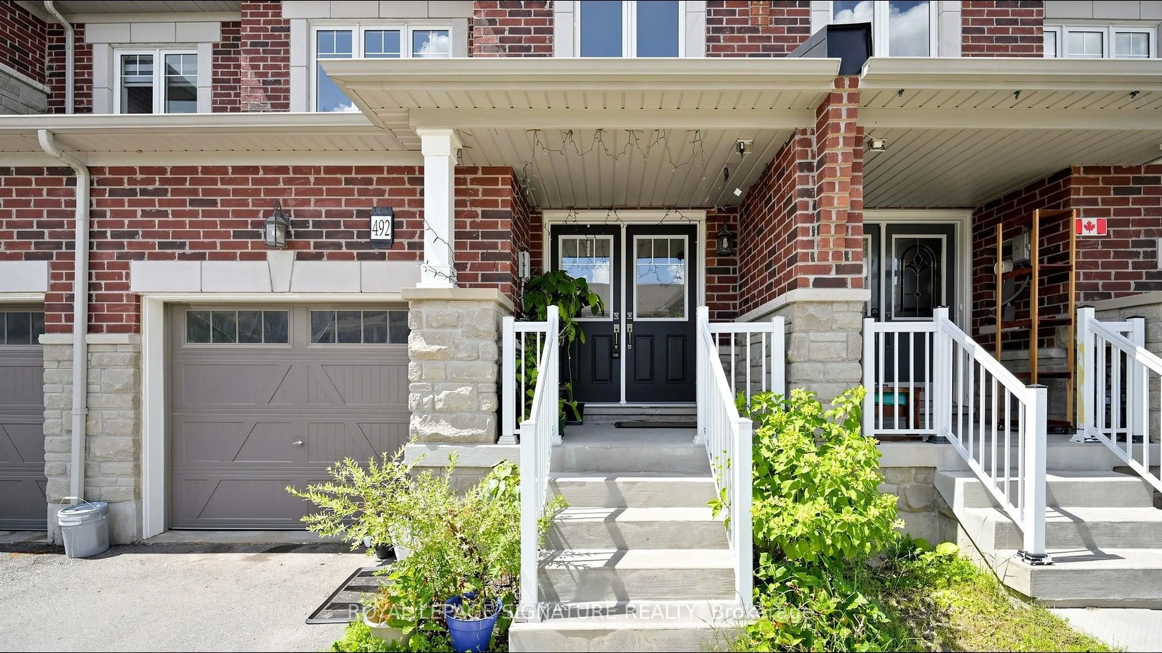 Home with brick exterior material, street for 492 Queen Mary Dr, Brampton Ontario L7A 0C7