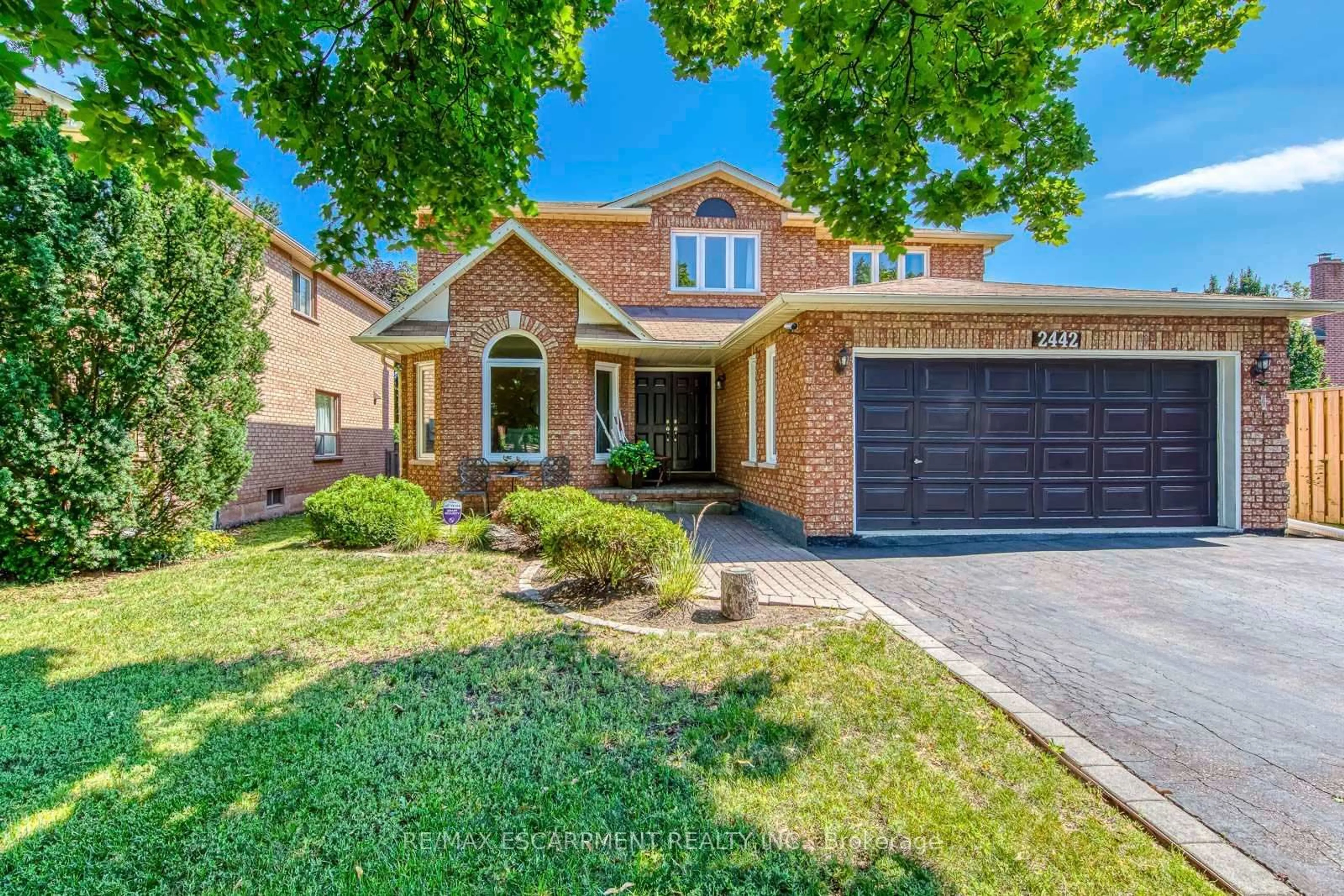 Home with brick exterior material, street for 2442 Wynten Way, Oakville Ontario L6J 7K9
