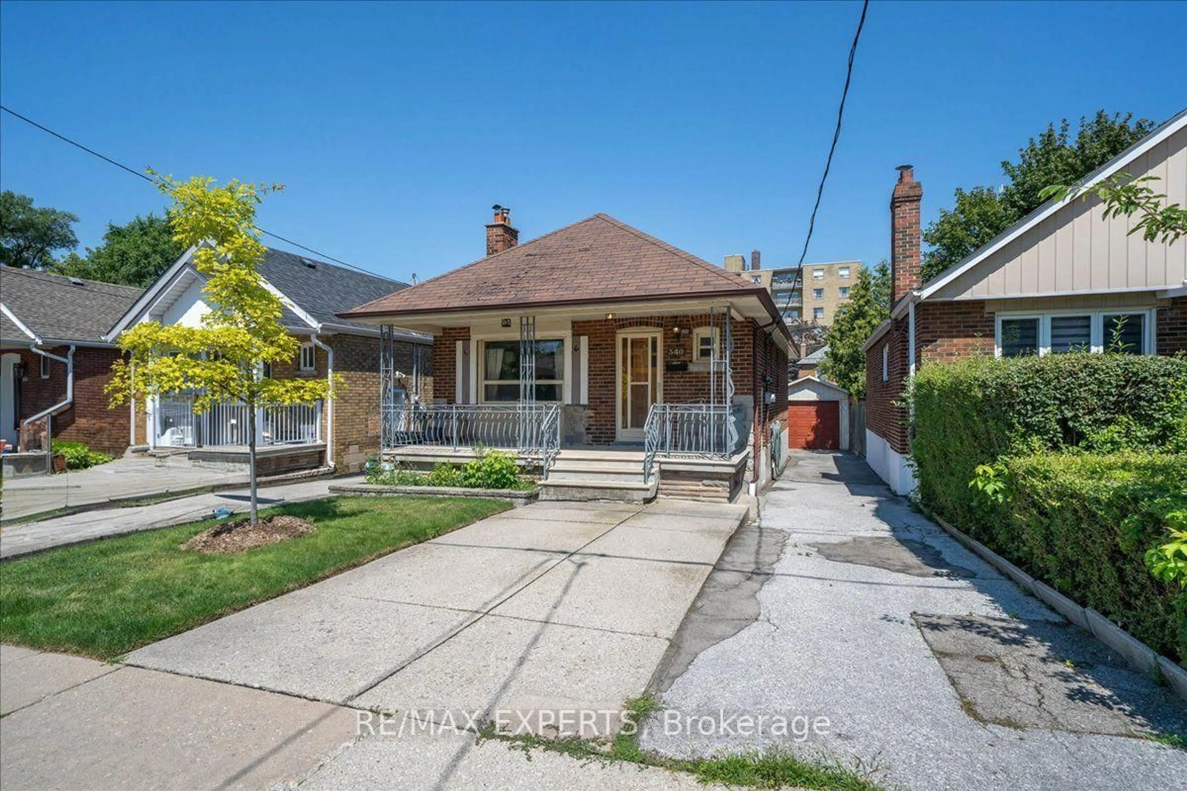 Home with brick exterior material, street for 340 Whitmore Ave, Toronto Ontario M6E 2N4