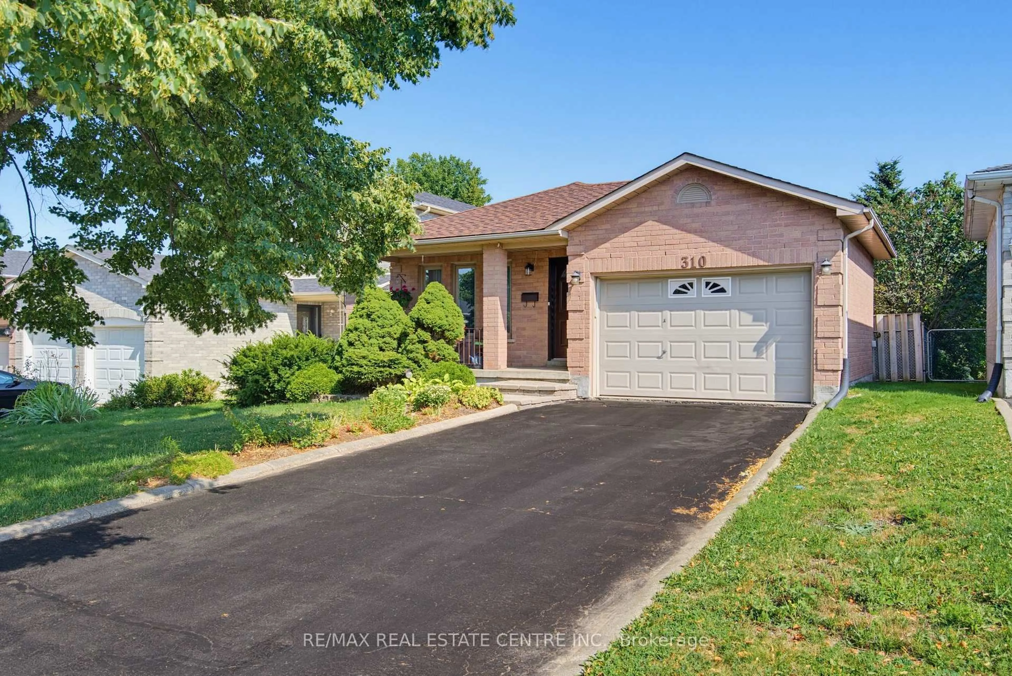 Home with brick exterior material, street for 310 Bailey Dr, Orangeville Ontario L9W 4M3