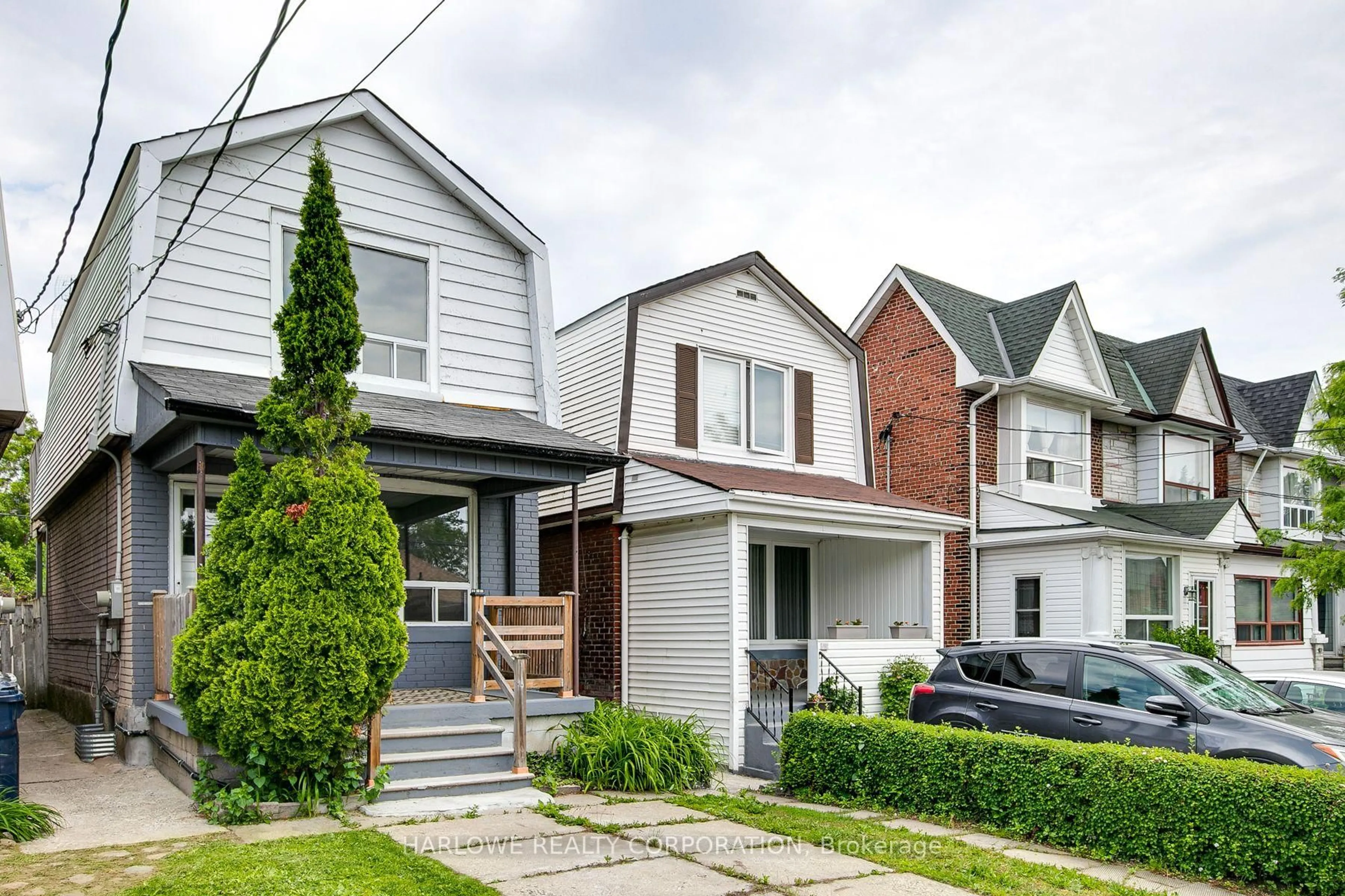 Home with brick exterior material, street for 61 Castleton Ave, Toronto Ontario M6N 3Z7