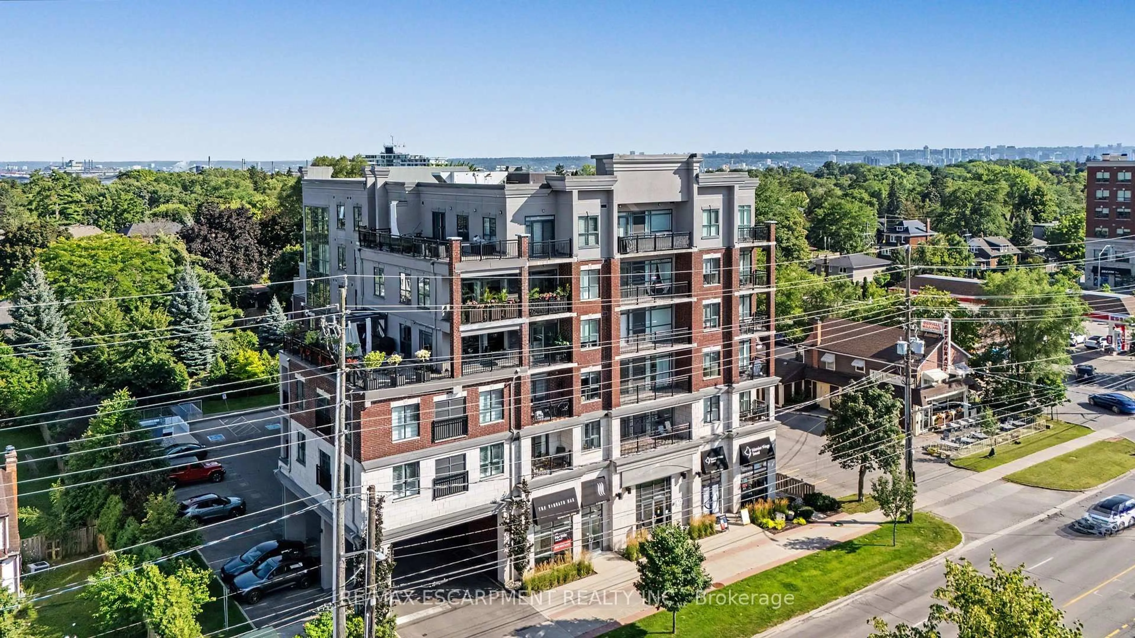 A pic from outside/outdoor area/front of a property/back of a property/a pic from drone, city buildings view from balcony for 34 Plains Rd #206, Burlington Ontario L7T 0B9