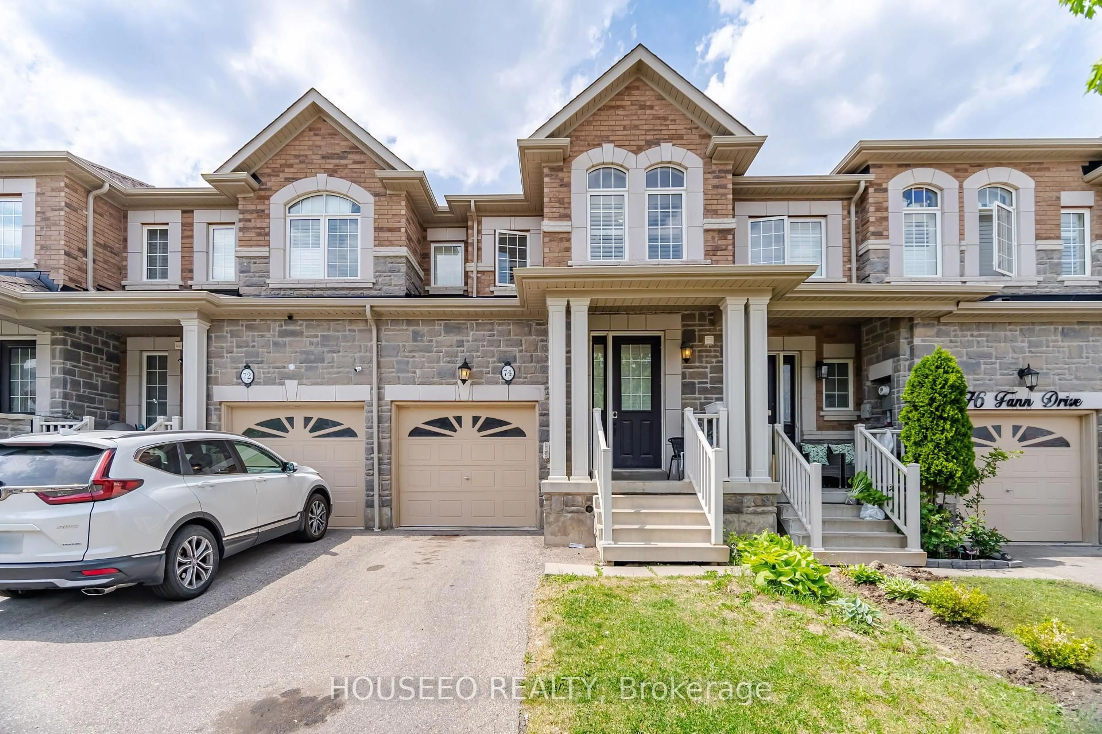 Home with brick exterior material, street for 74 Fann Dr, Brampton Ontario L7A 4L5