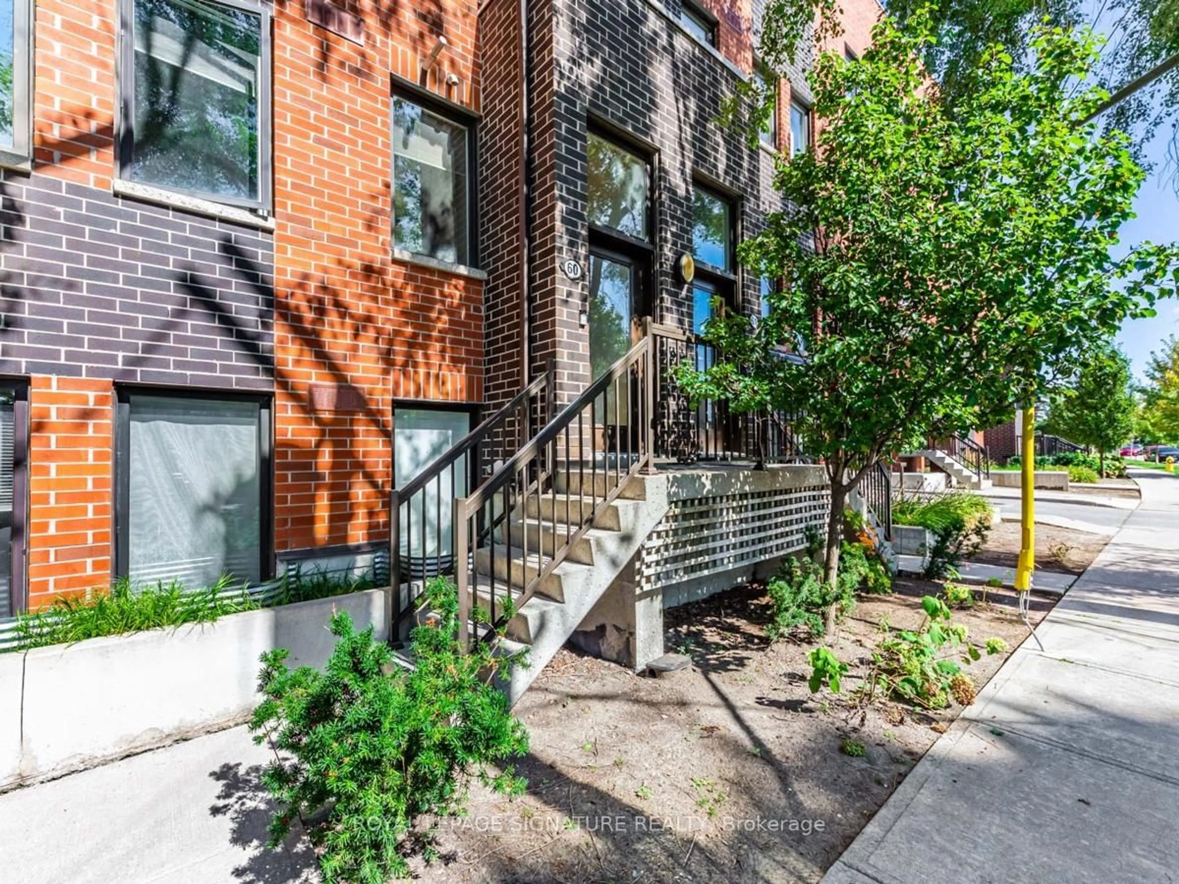 Home with brick exterior material, street for 68 Winston Park Blvd #60, Toronto Ontario M3K 1C3
