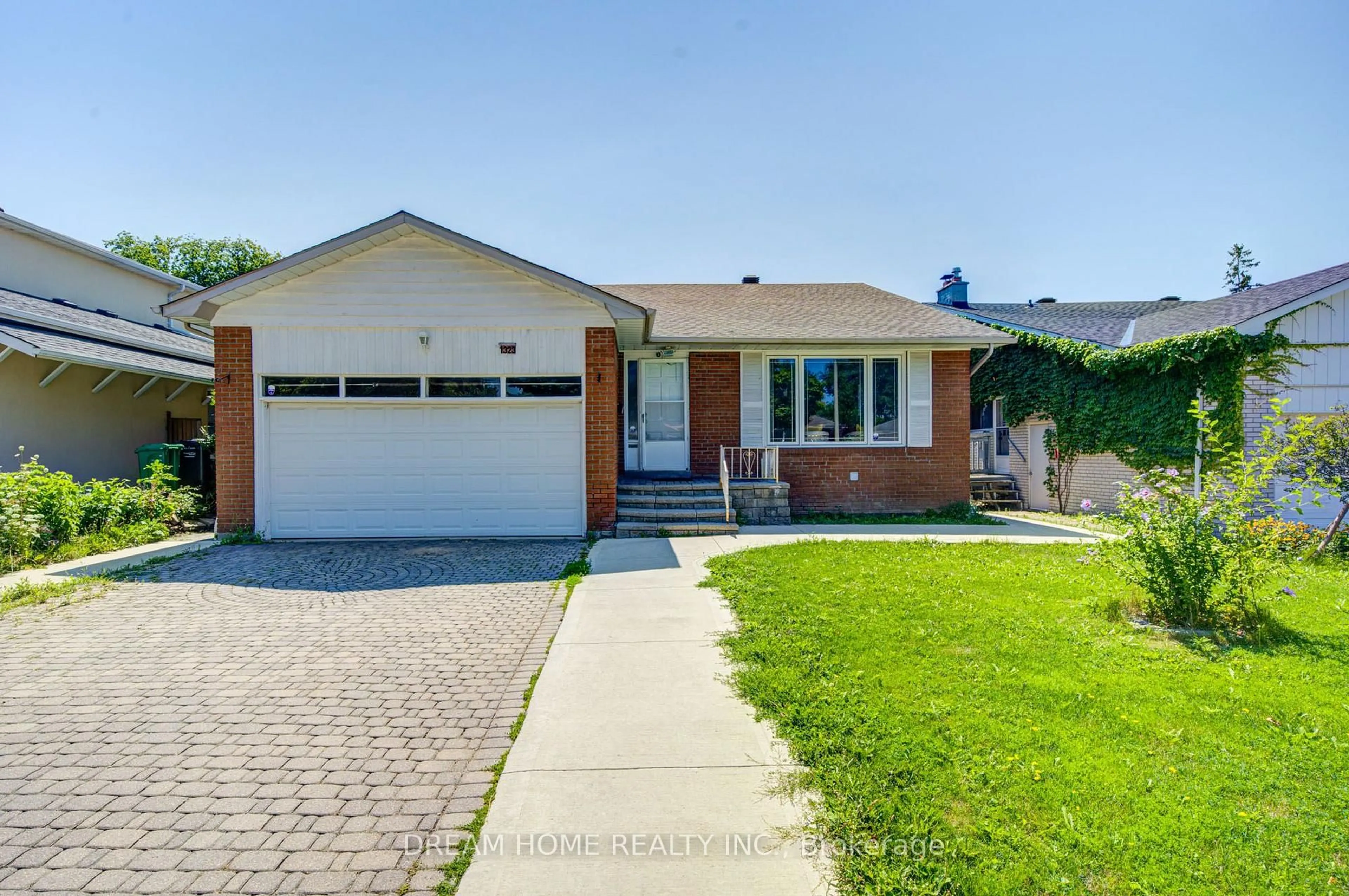 Home with brick exterior material, street for 1323 Shamir Cres, Mississauga Ontario L5C 1L2