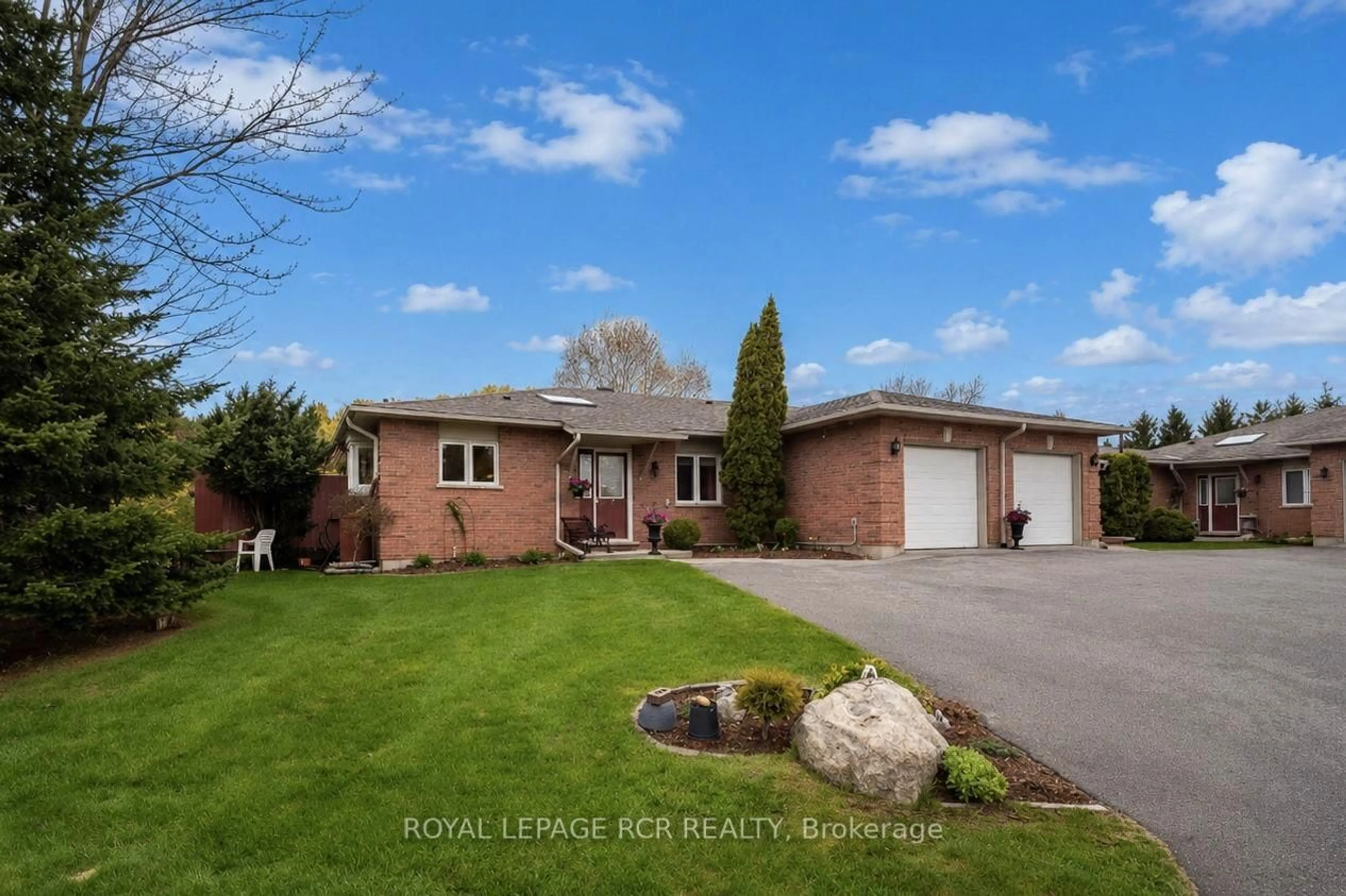 A pic from outside/outdoor area/front of a property/back of a property/a pic from drone, water/lake/river/ocean view for 28 Reddington Dr #1, Caledon Ontario L7E 0E4