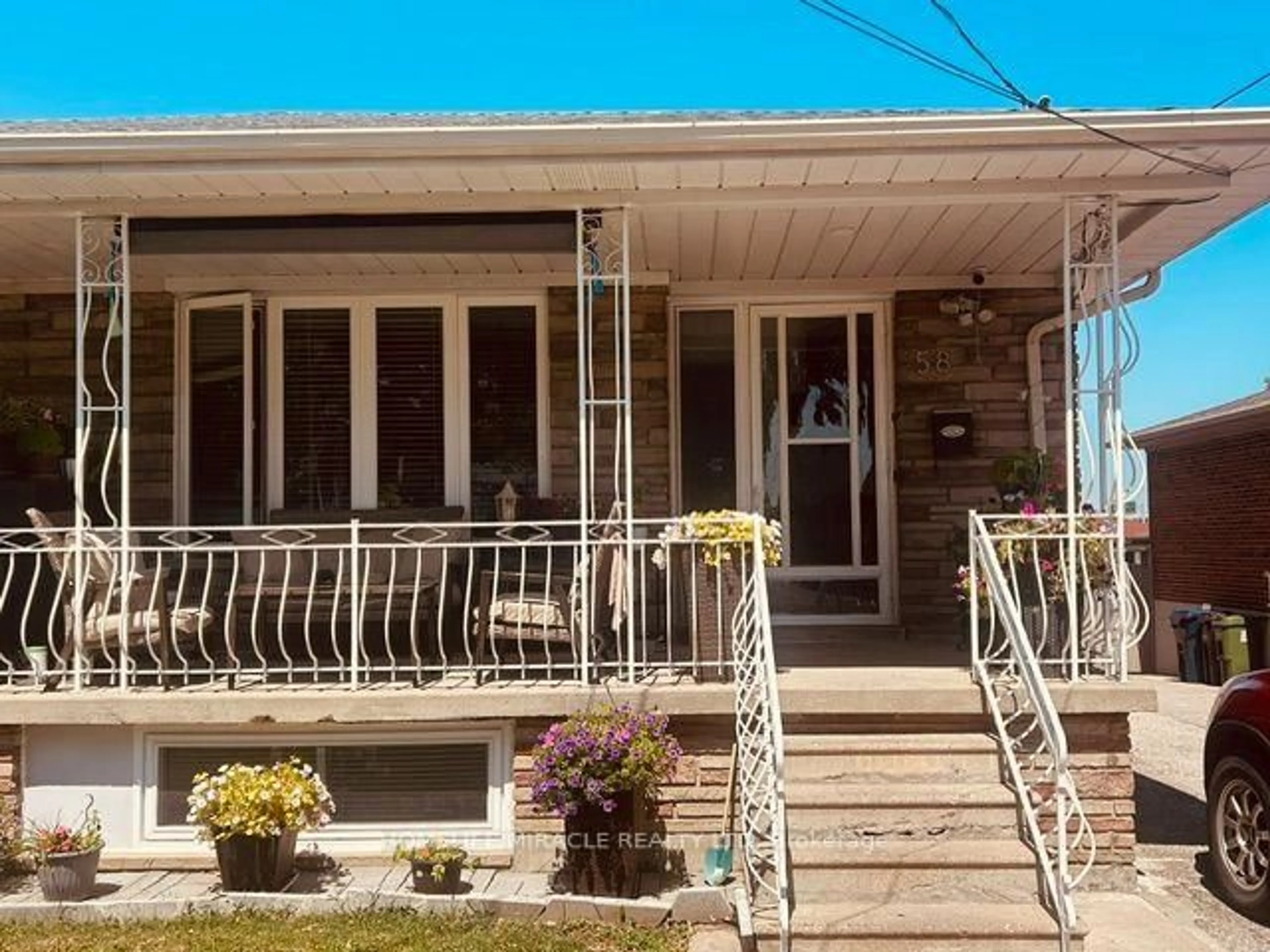 Home with vinyl exterior material, street for 58 Telco Cres, Toronto Ontario M9N 3L4