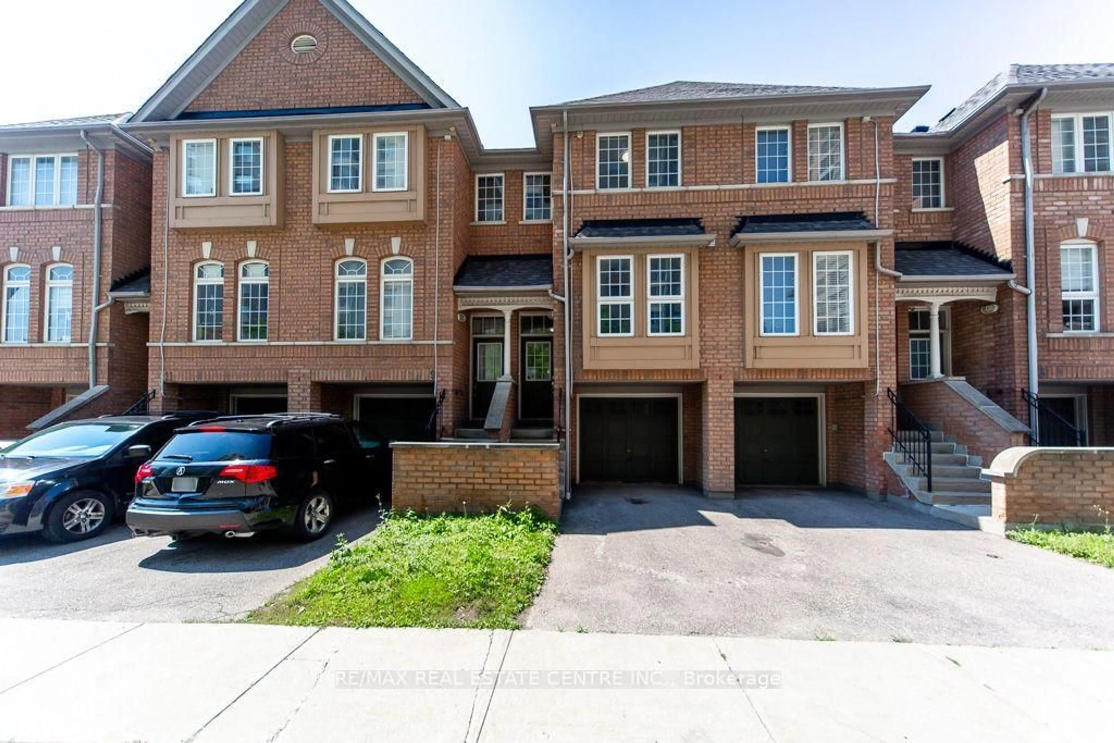 Home with brick exterior material, street for 50 Strathaven Dr #7, Mississauga Ontario L5R 4E7