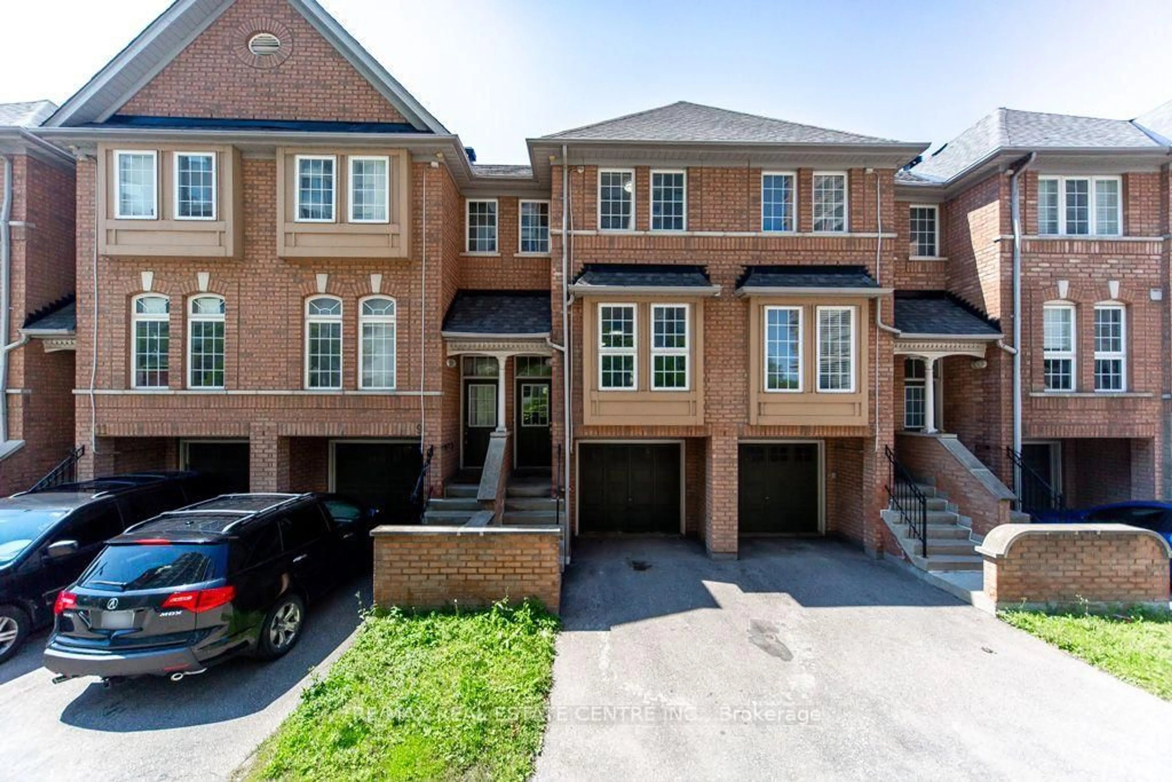 Home with brick exterior material, street for 50 Strathaven Dr #7, Mississauga Ontario L5R 4E7