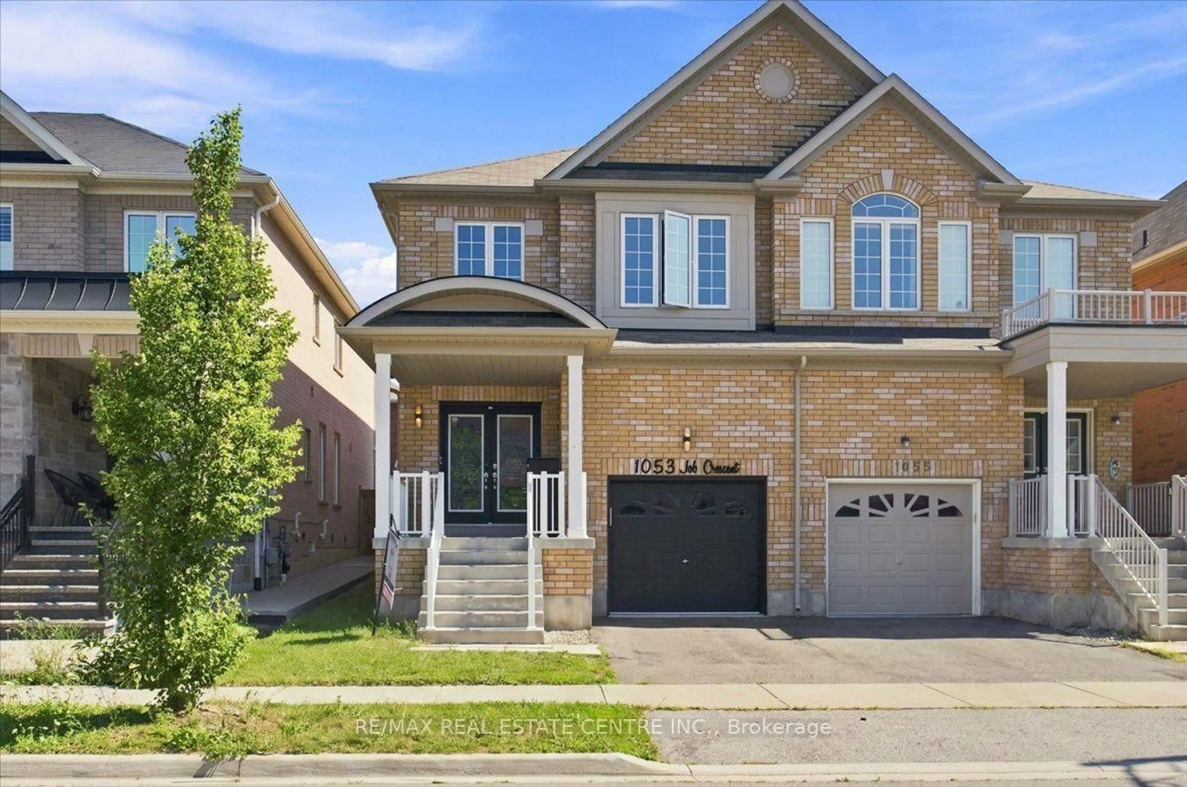 Home with brick exterior material, street for 1053 Job Cres, Milton Ontario L9T 8V6
