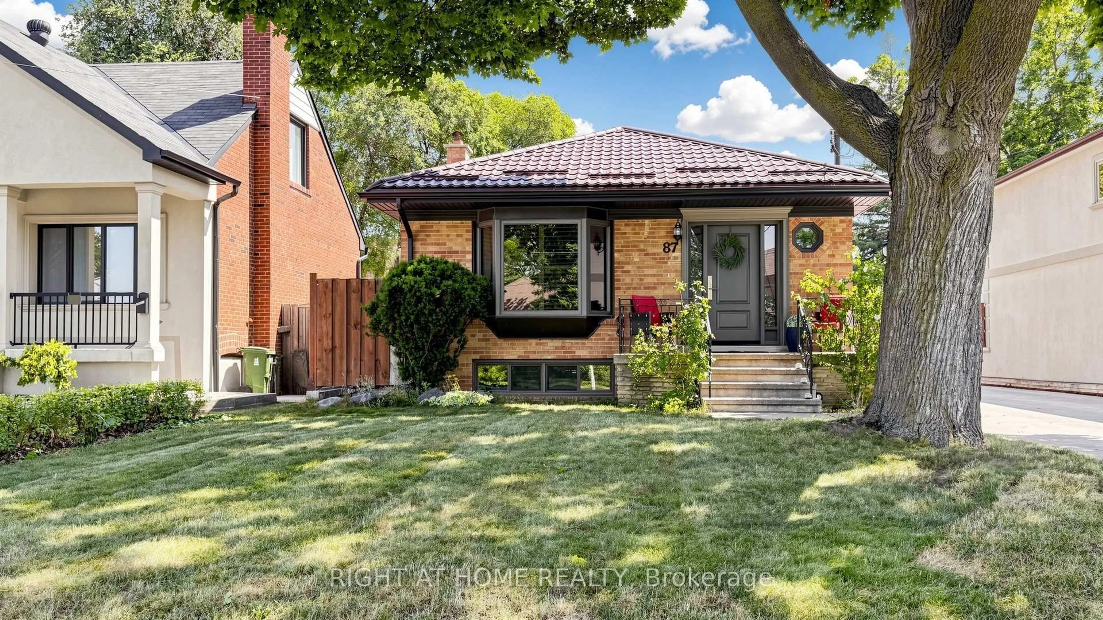 Home with brick exterior material, street for 87 Riverdale Dr, Toronto Ontario M9V 2T8