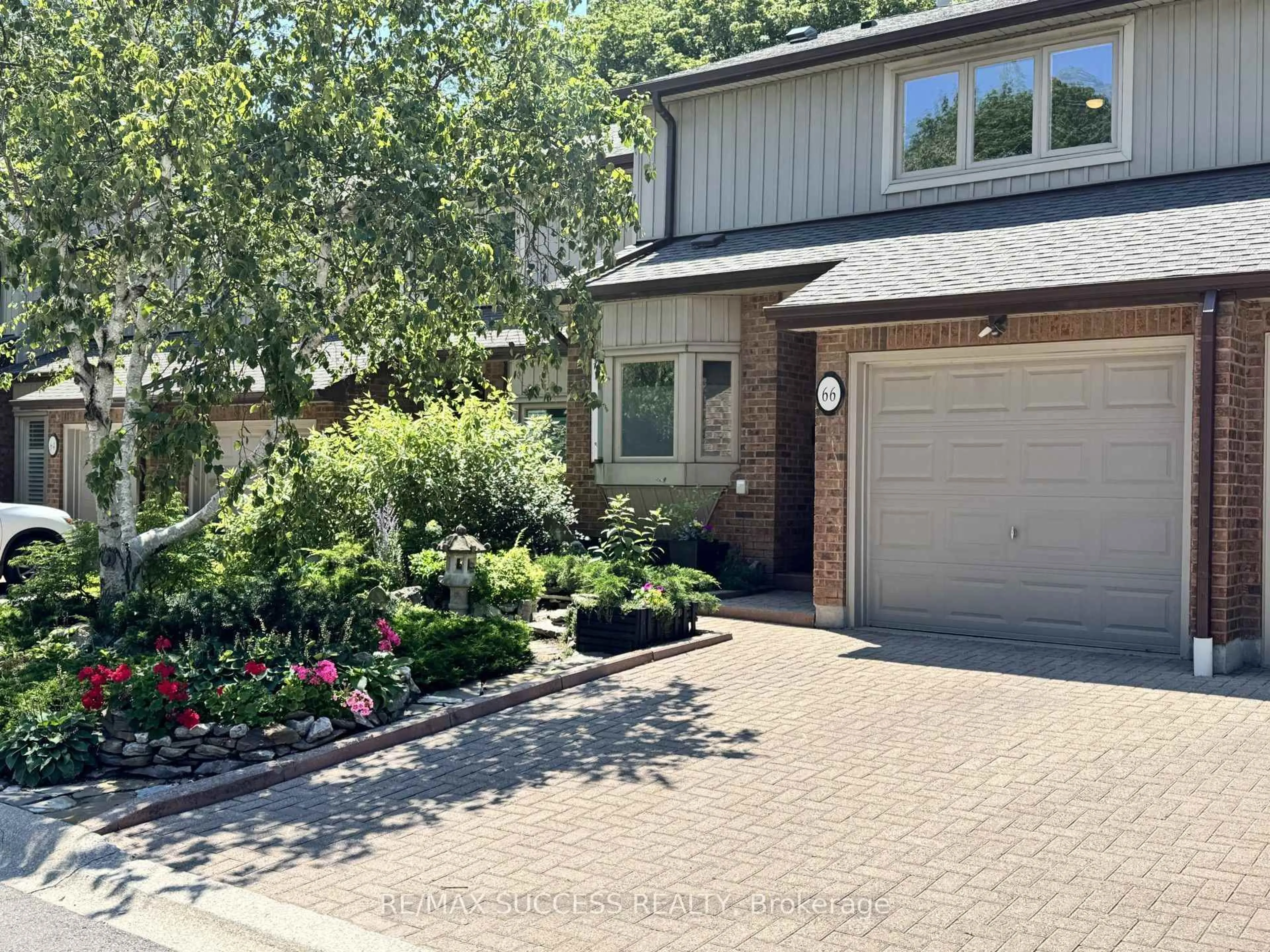 Home with brick exterior material, street for 1200 Walden Circ #66, Mississauga Ontario L5J 4J9
