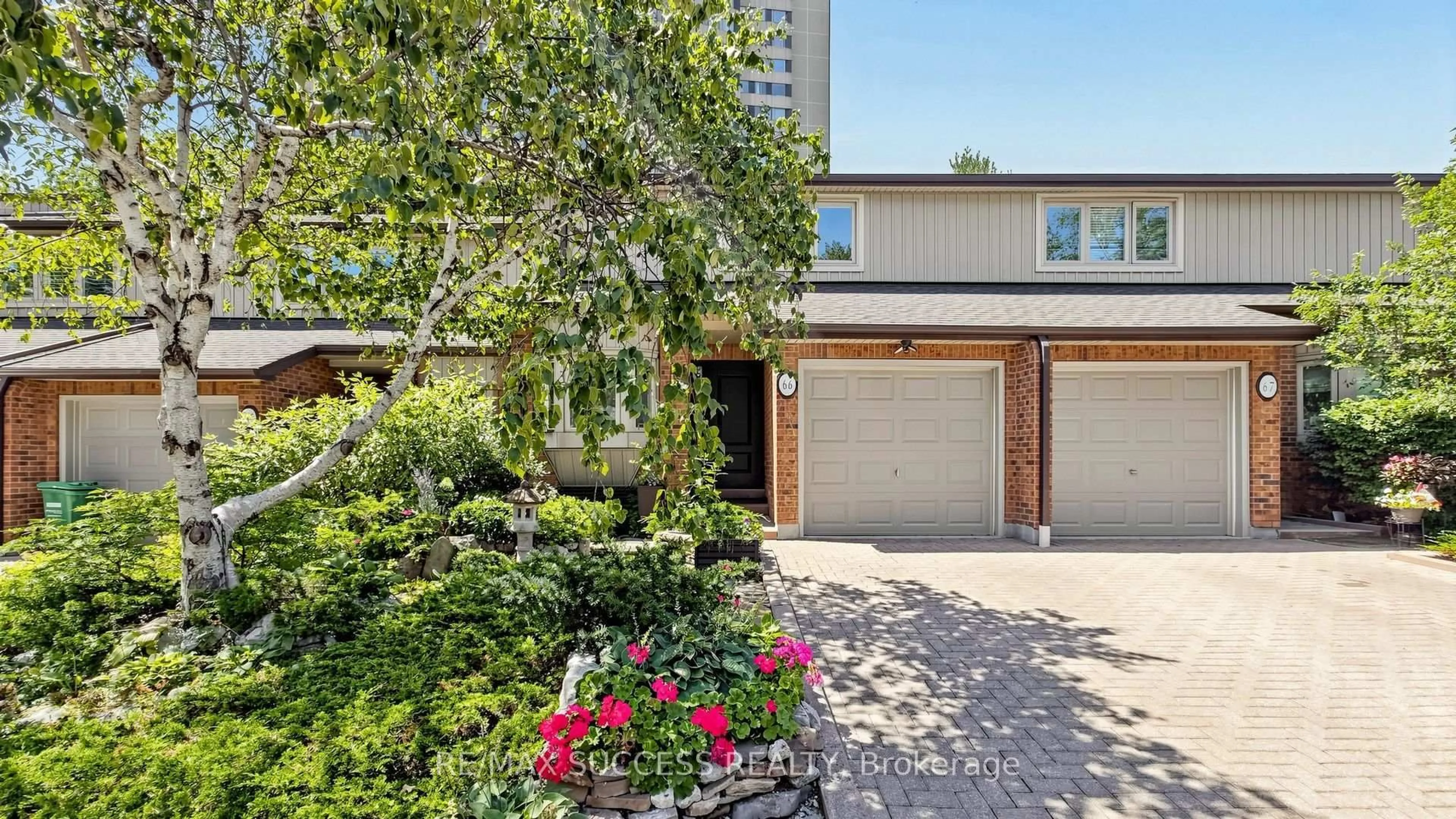 Home with brick exterior material, street for 1200 Walden Circ #66, Mississauga Ontario L5J 4J9
