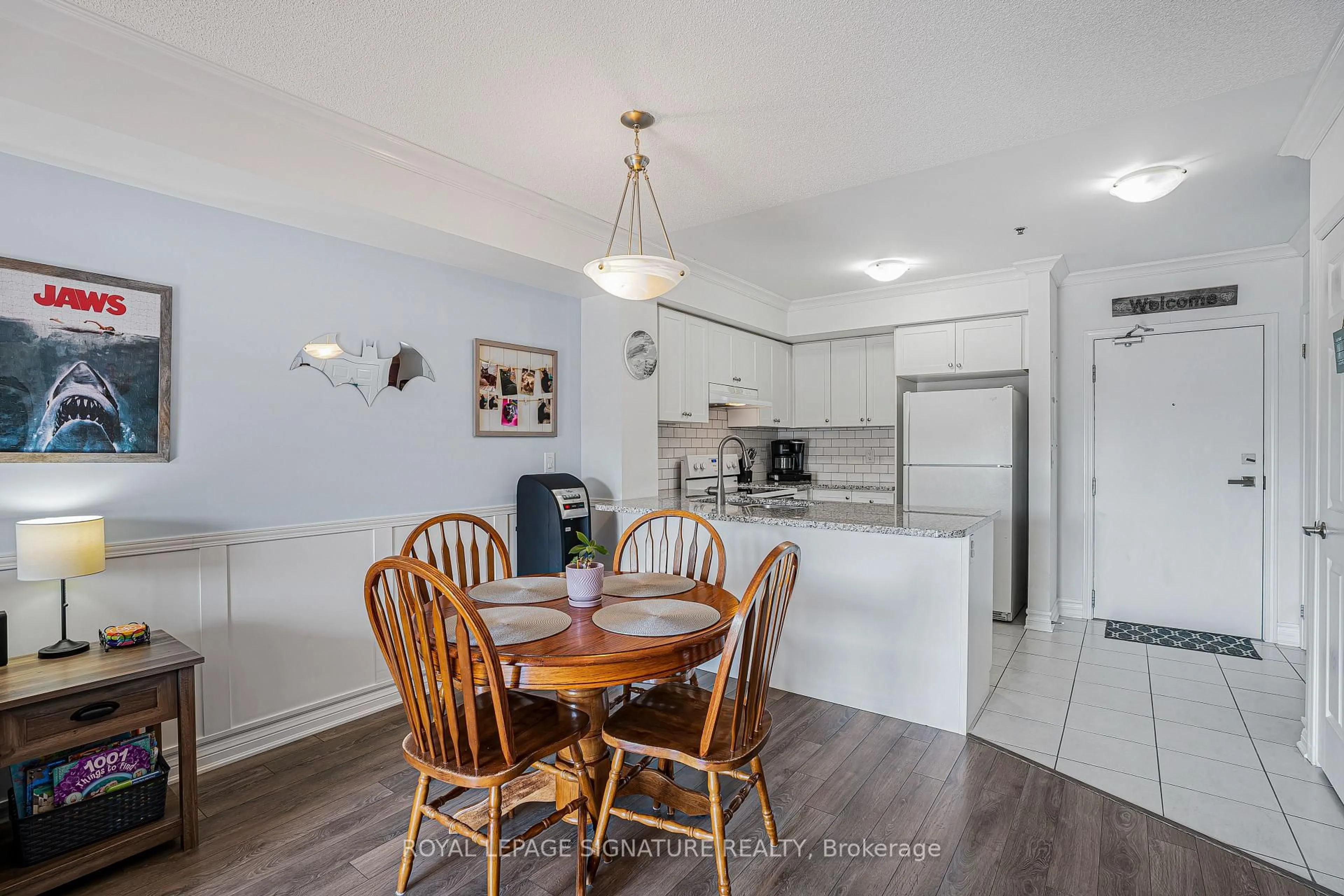 Open concept kitchen, wood/laminate floor for 70 Baycliffe Cres #312, Brampton Ontario L7A 0Z5