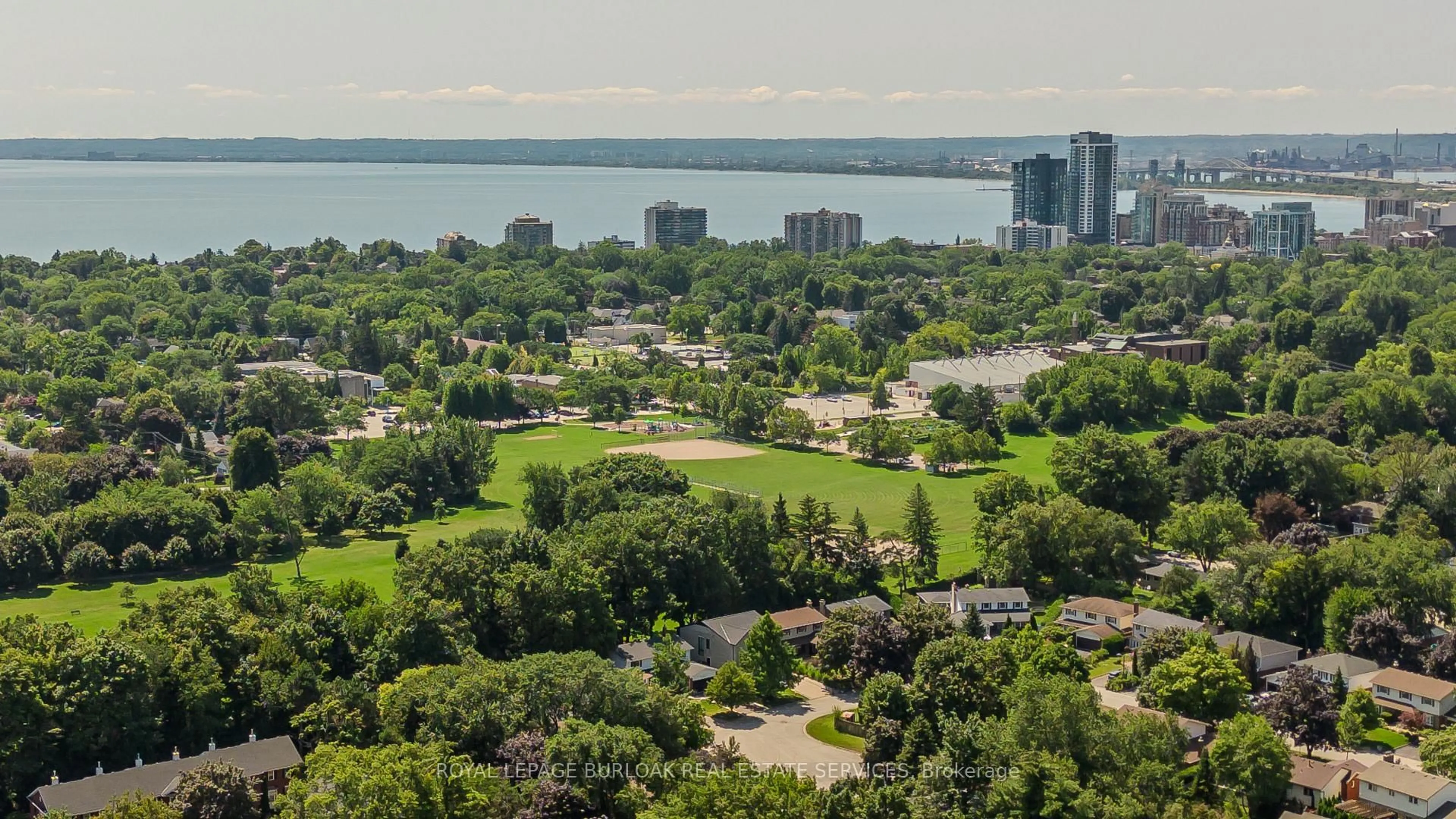 A pic from outside/outdoor area/front of a property/back of a property/a pic from drone, water/lake/river/ocean view for 2410 Woodward Ave #4, Burlington Ontario L7R 1T9