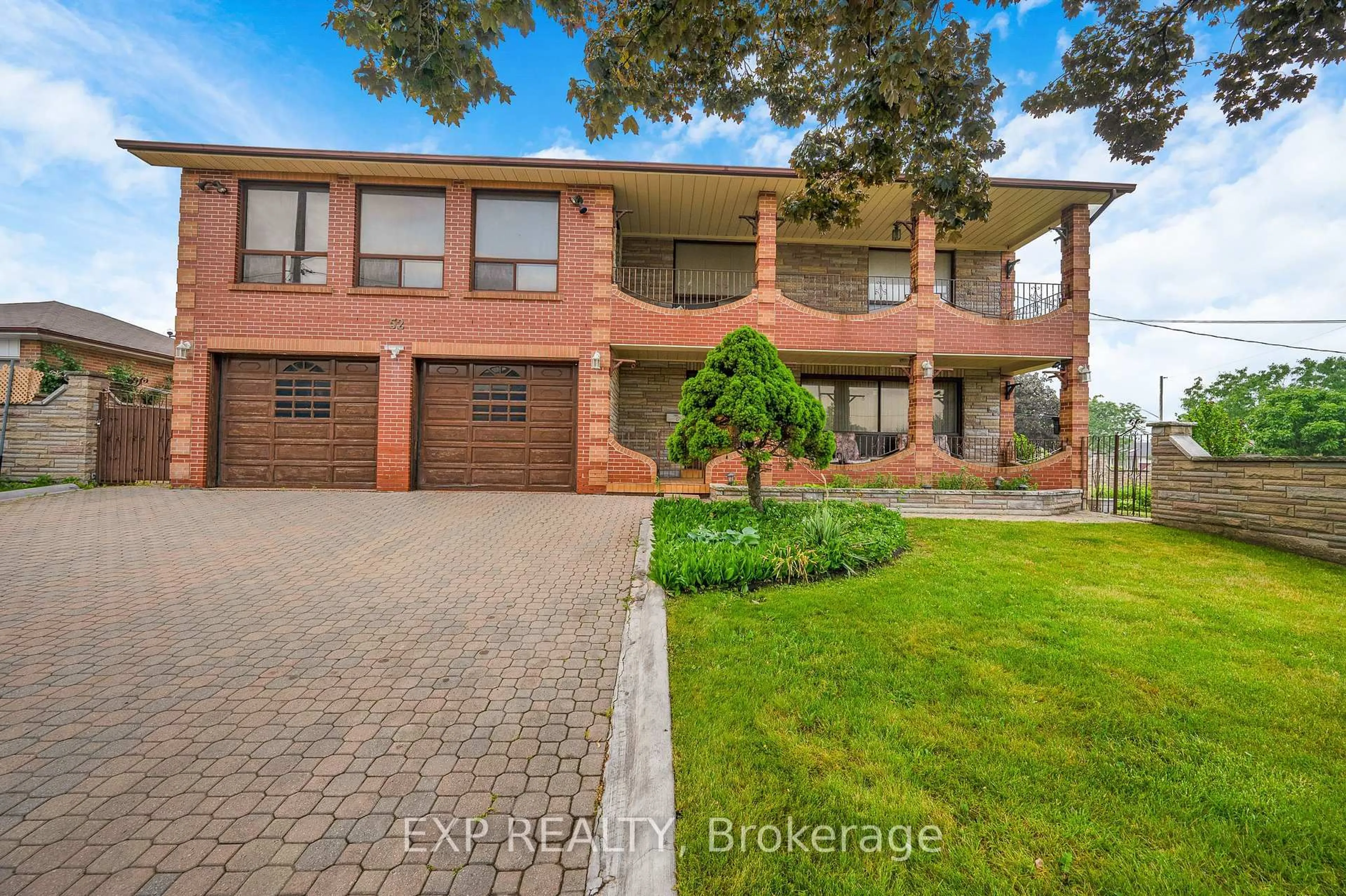 Home with brick exterior material, street for 52 Storer Dr, Toronto Ontario M9M 1X5