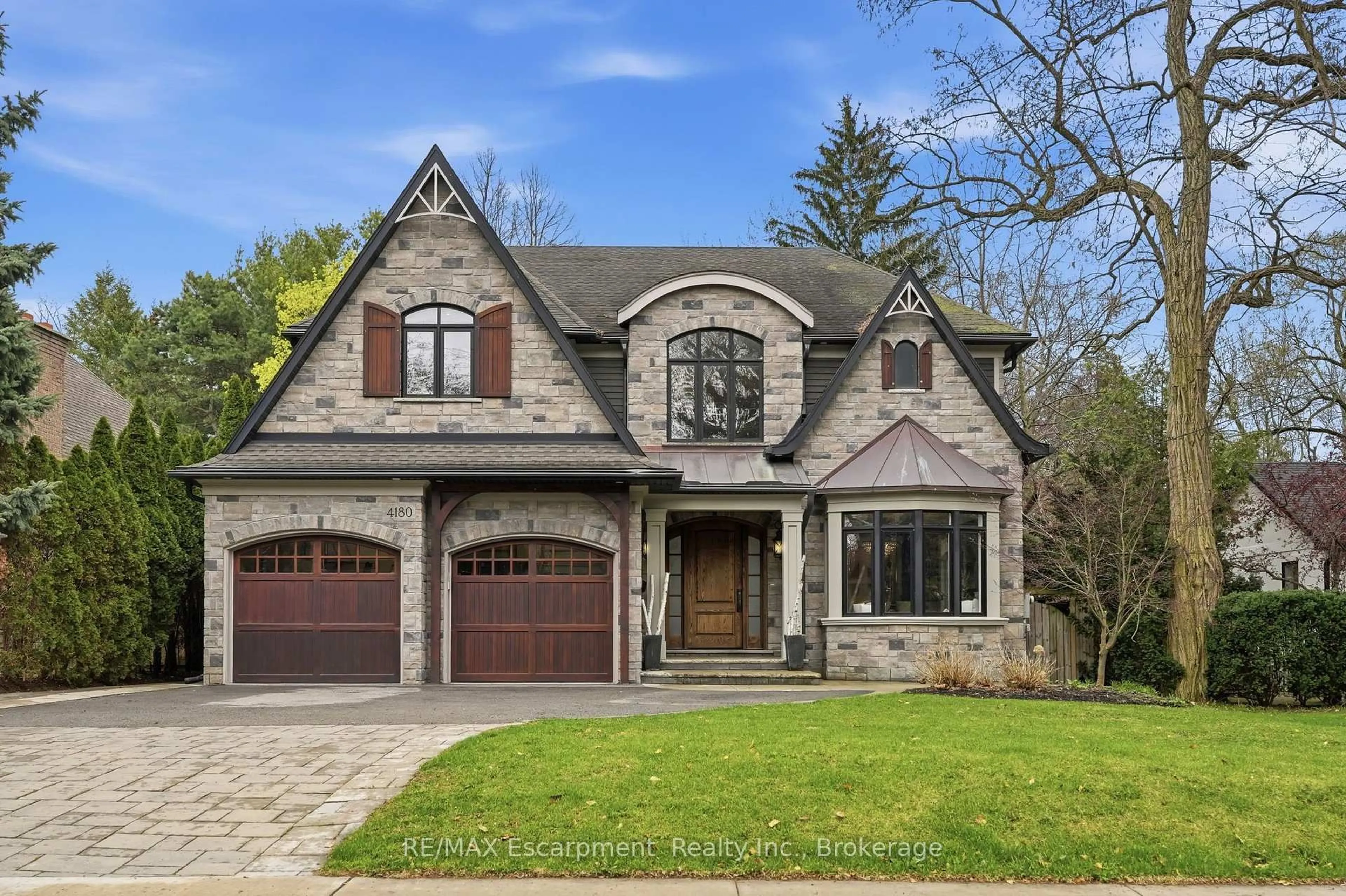 Home with brick exterior material, street for 4180 Lakeshore Rd, Burlington Ontario L7L 1A4