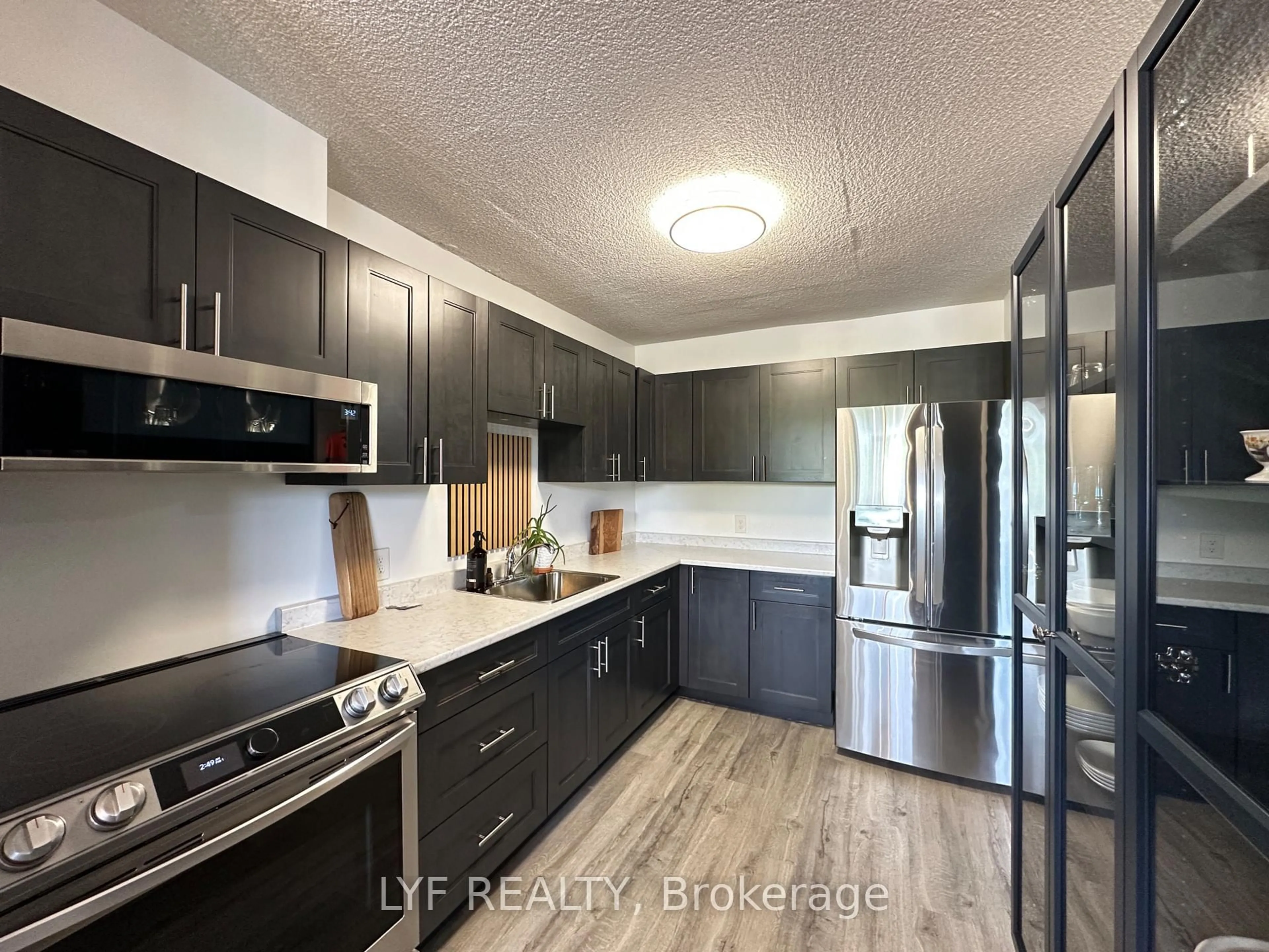 Open concept kitchen, unknown for 81 MILLSIDE Dr #401, Milton Ontario L9T 3X4