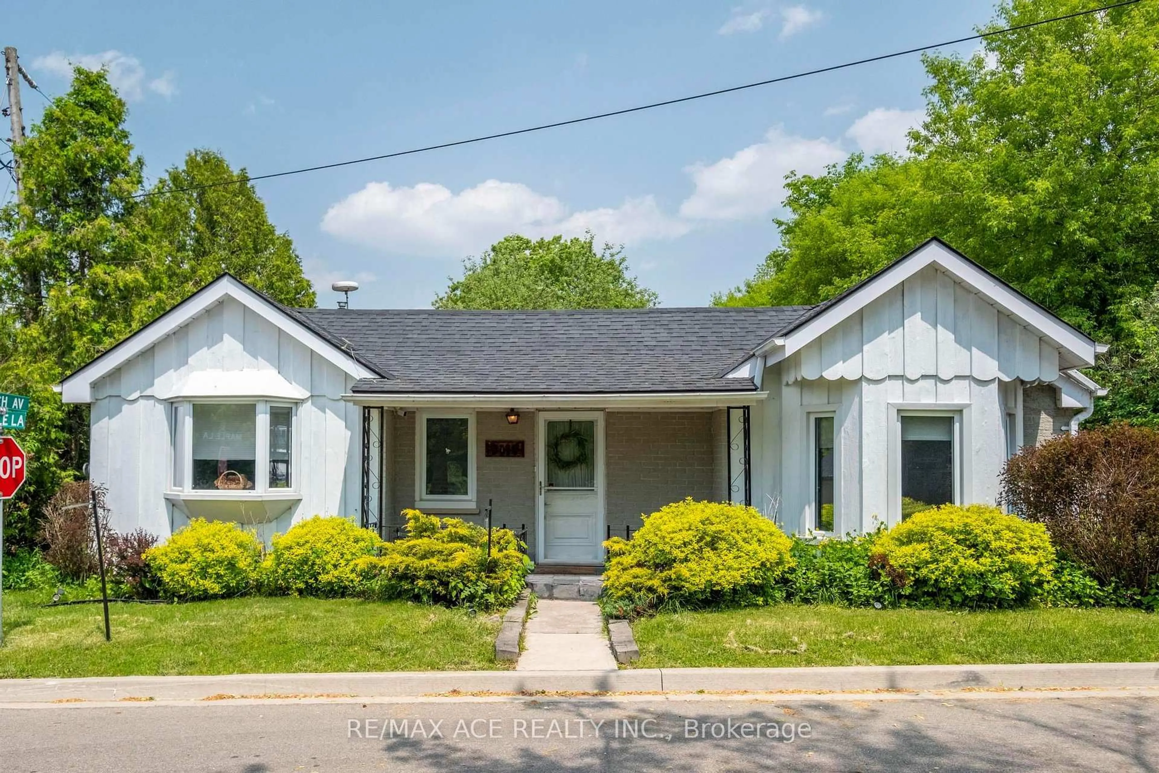 Home with vinyl exterior material, street for 11 Maple Lane, Caledon Ontario L7E 0L3