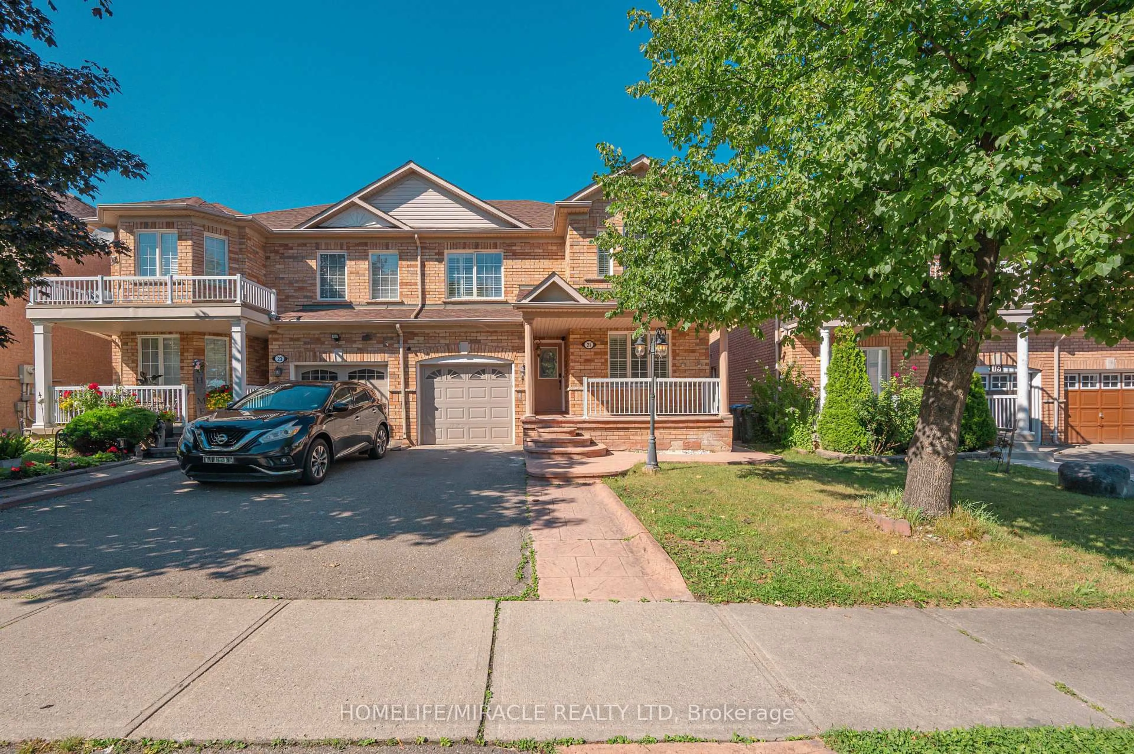 Home with brick exterior material, street for 21 Topiary Lane, Brampton Ontario L7A 2K6