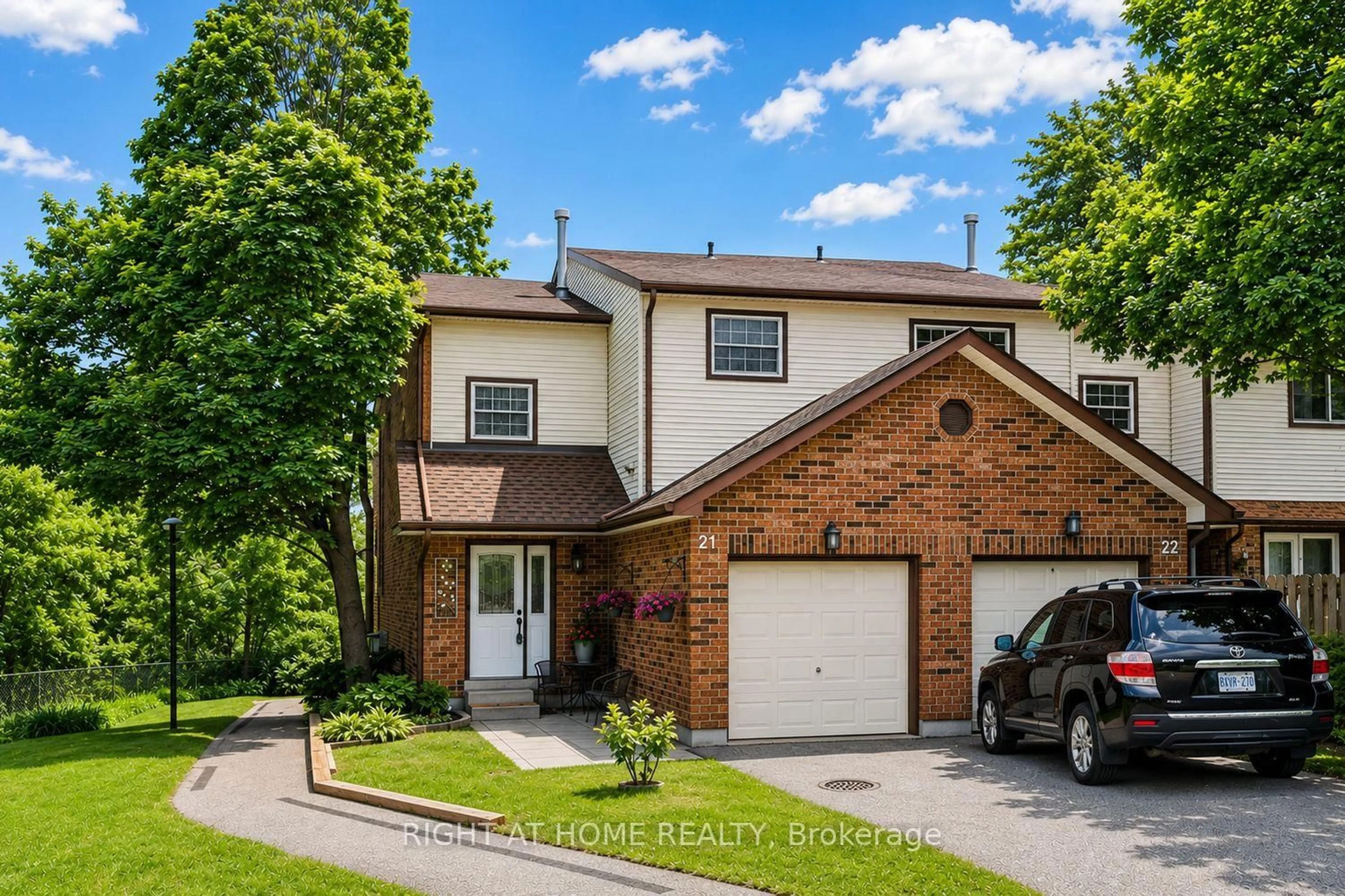Home with brick exterior material, street for 2065 Amherst Heights Crt #21, Burlington Ontario L7P 4R8