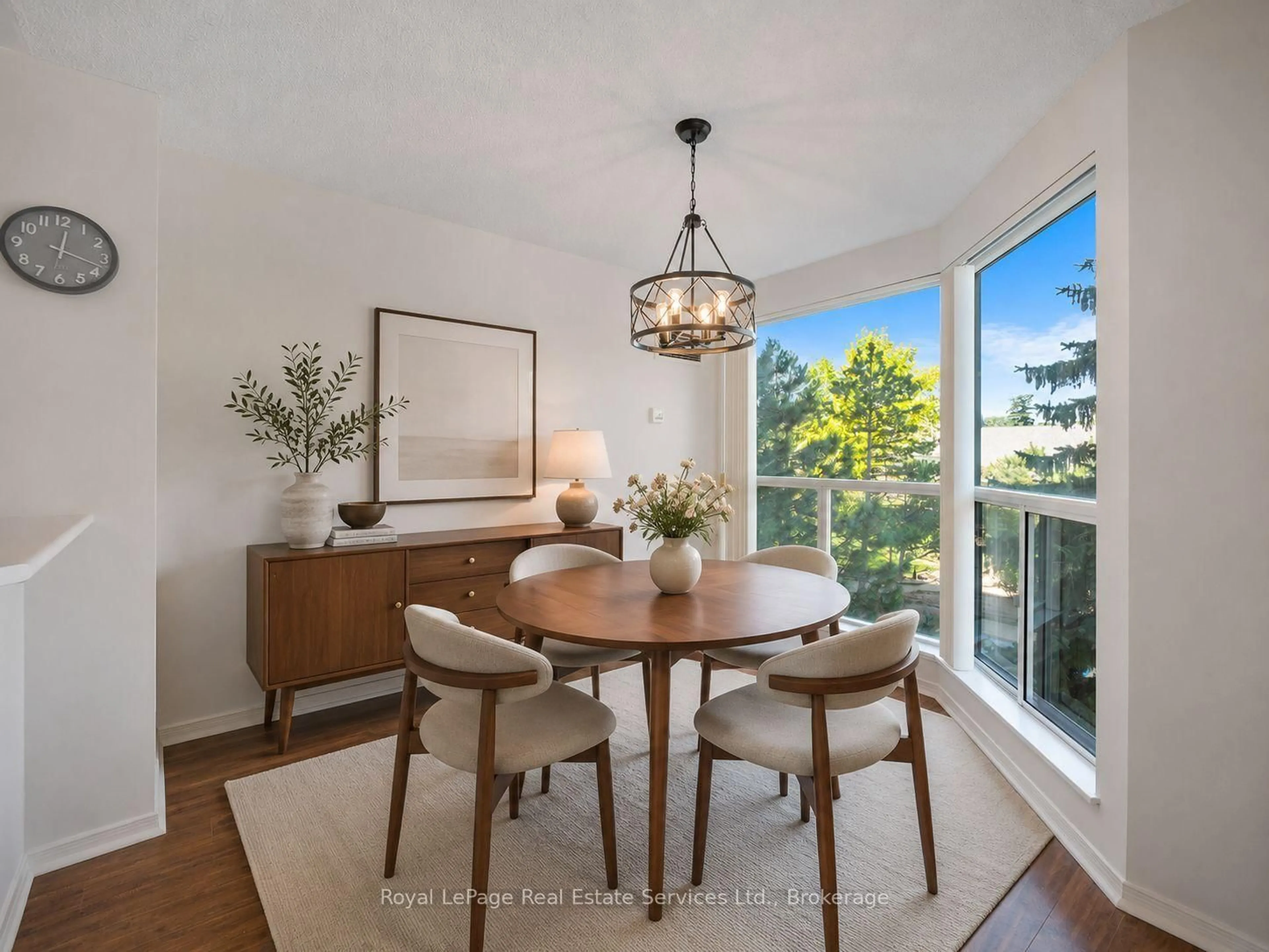 Dining room, wood/laminate floor for 2177 Burnhamthorpe Rd #309, Mississauga Ontario L5L 5P9