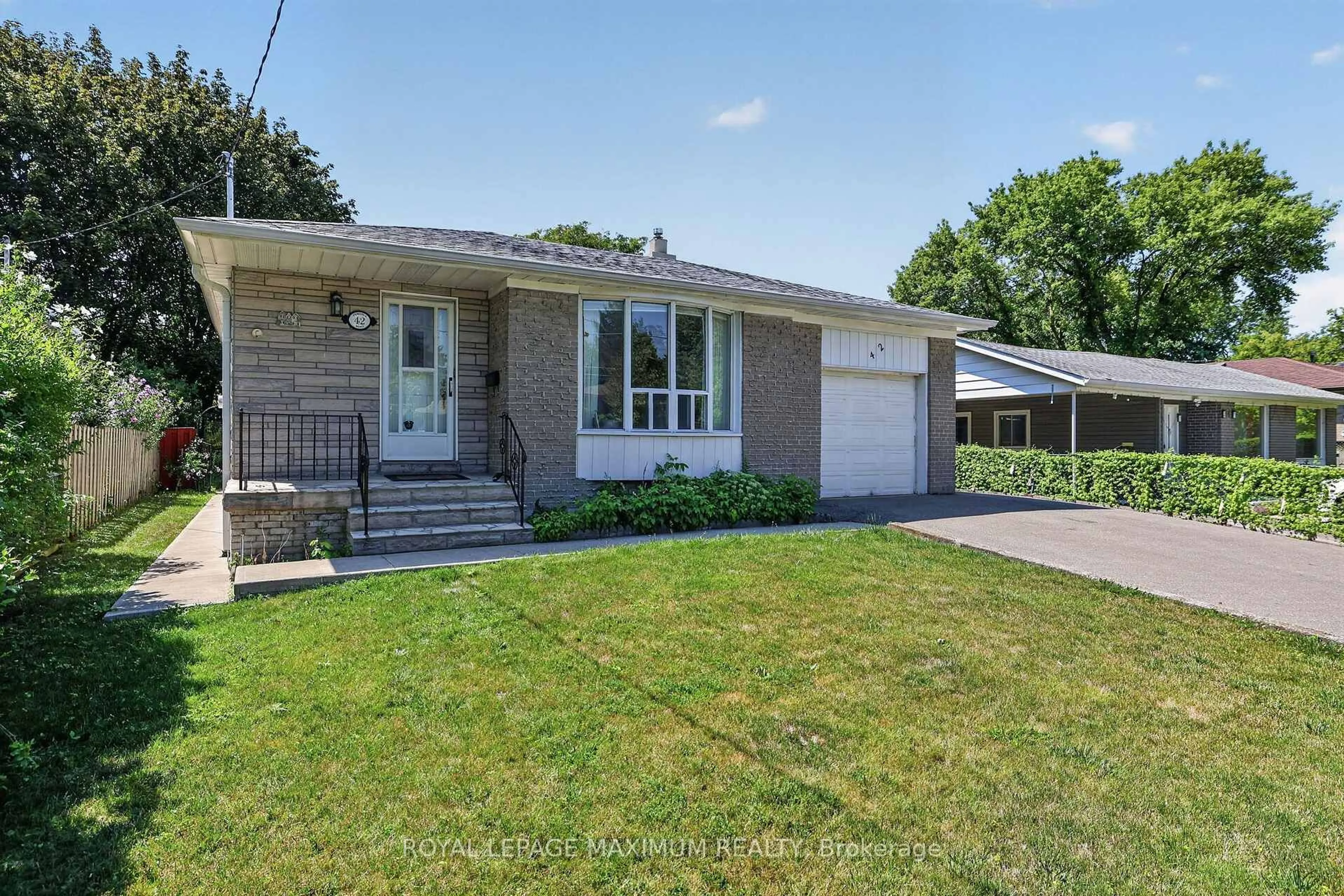 Home with brick exterior material, street for 42 Pergola Rd, Toronto Ontario M9W 5K6