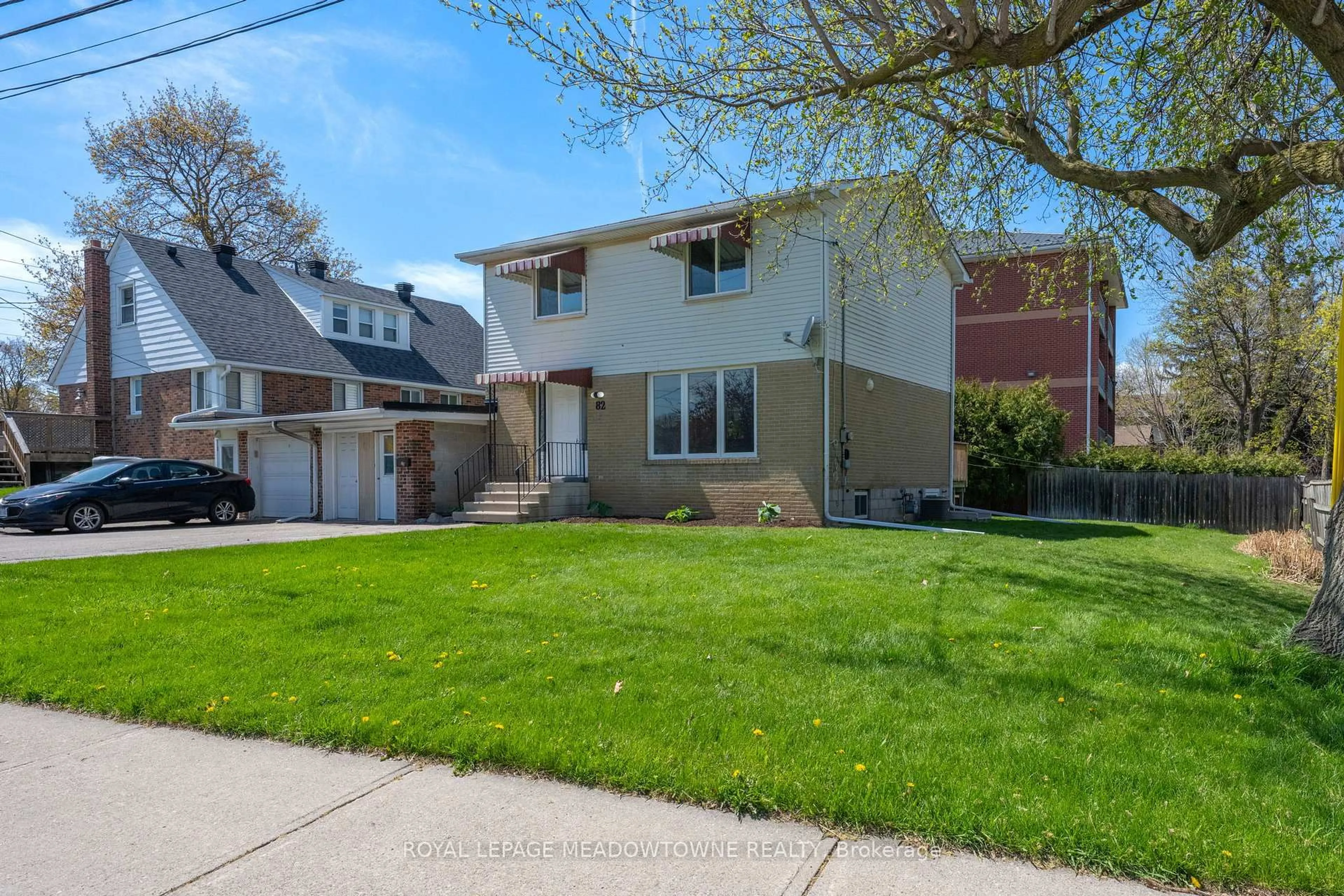 Home with vinyl exterior material, street for 82 Maple Ave, Halton Hills Ontario L7G 1X7
