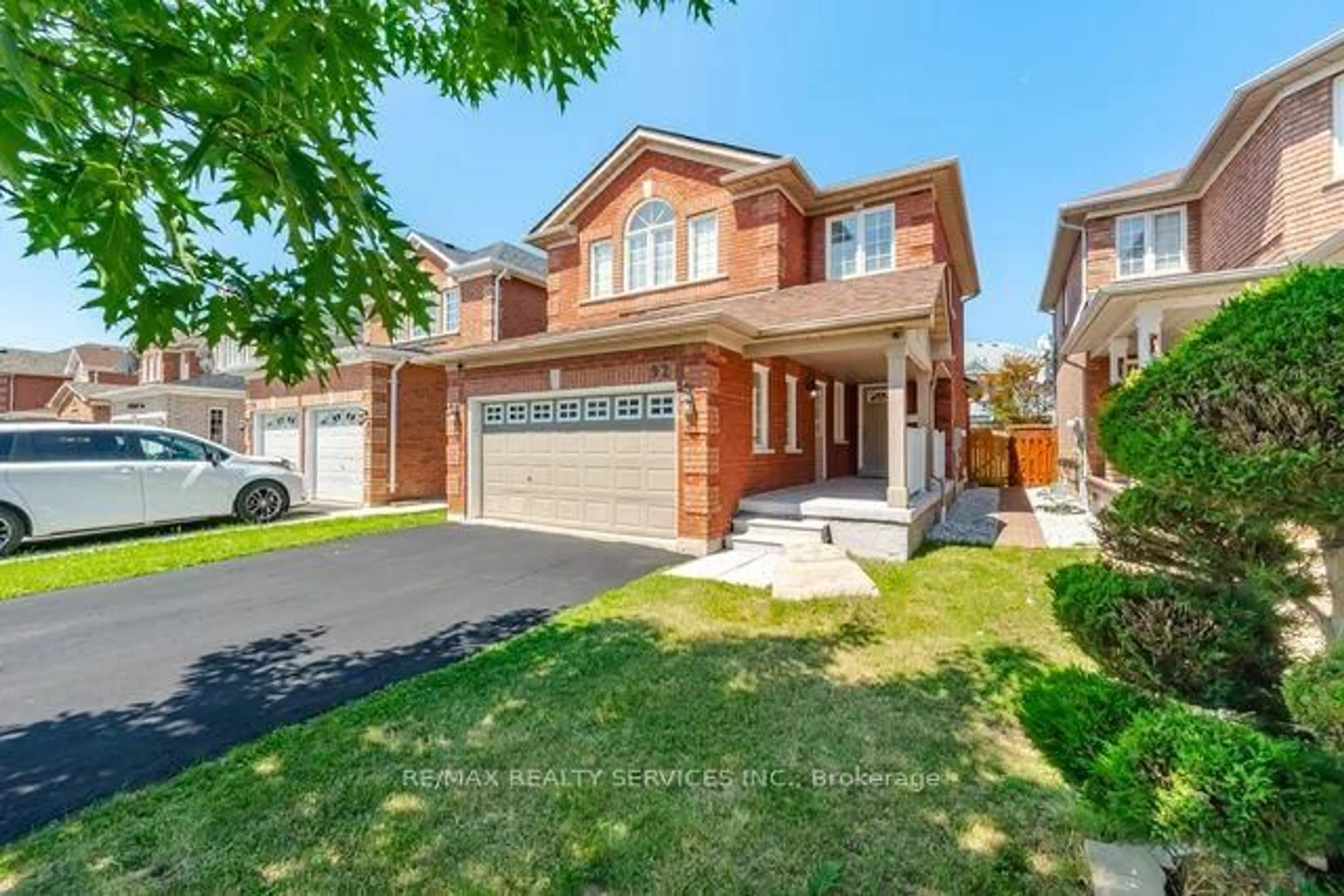 Home with brick exterior material, street for 92 Orchid Dr, Brampton Ontario L7A 2C4