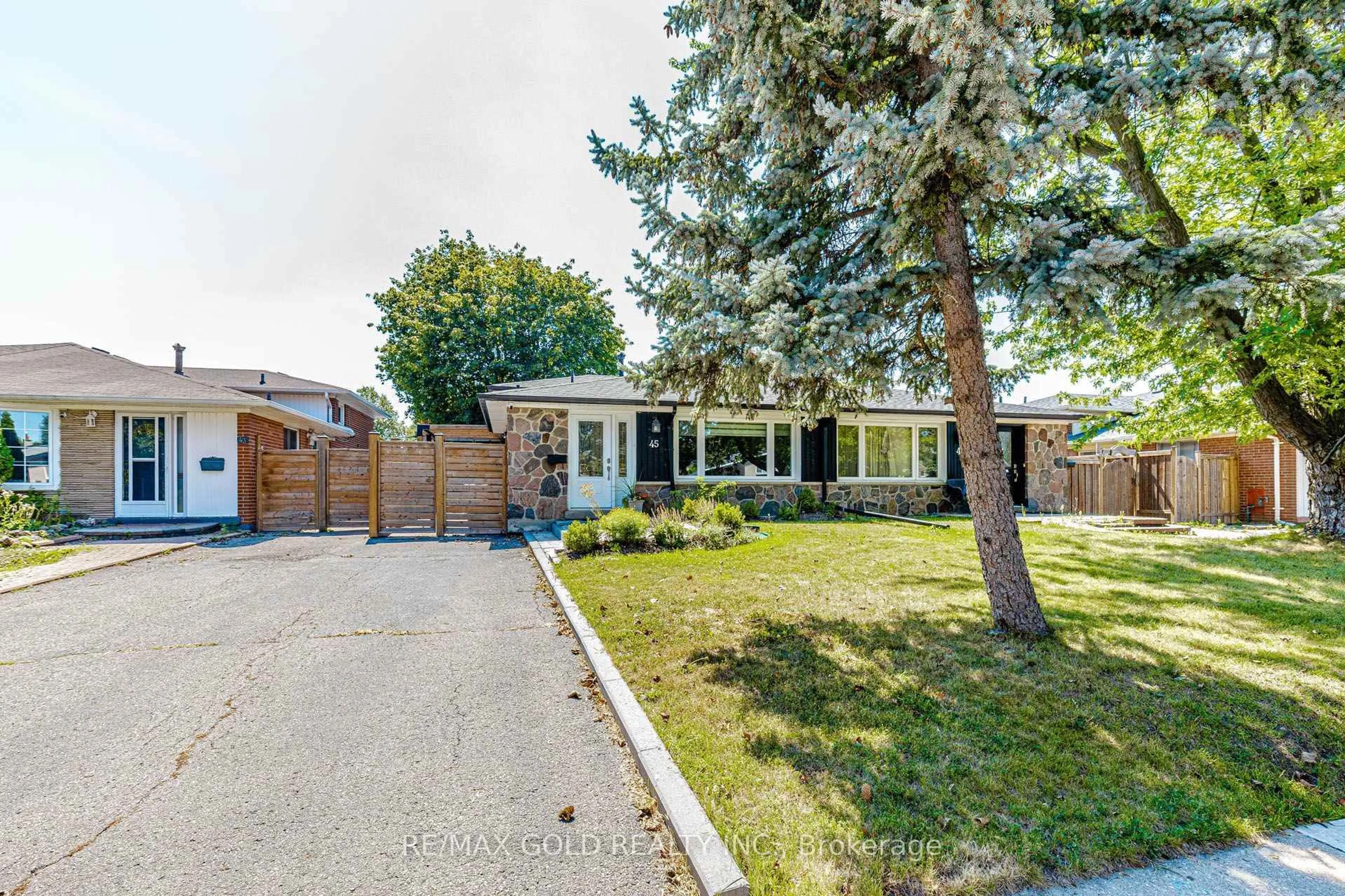 Home with brick exterior material, street for 45 Grange Dr, Brampton Ontario L6X 2H1