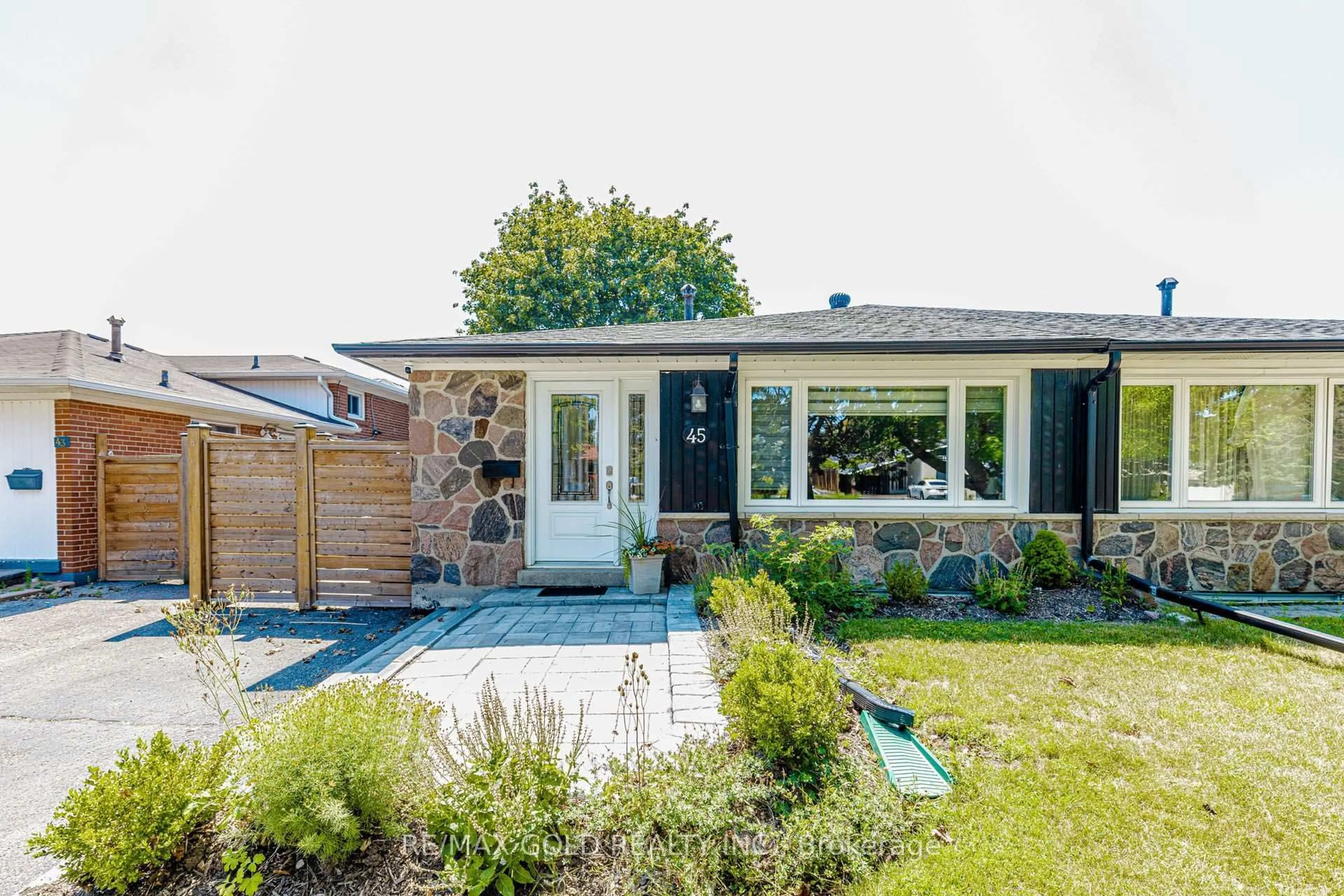 Home with brick exterior material, street for 45 Grange Dr, Brampton Ontario L6X 2H1