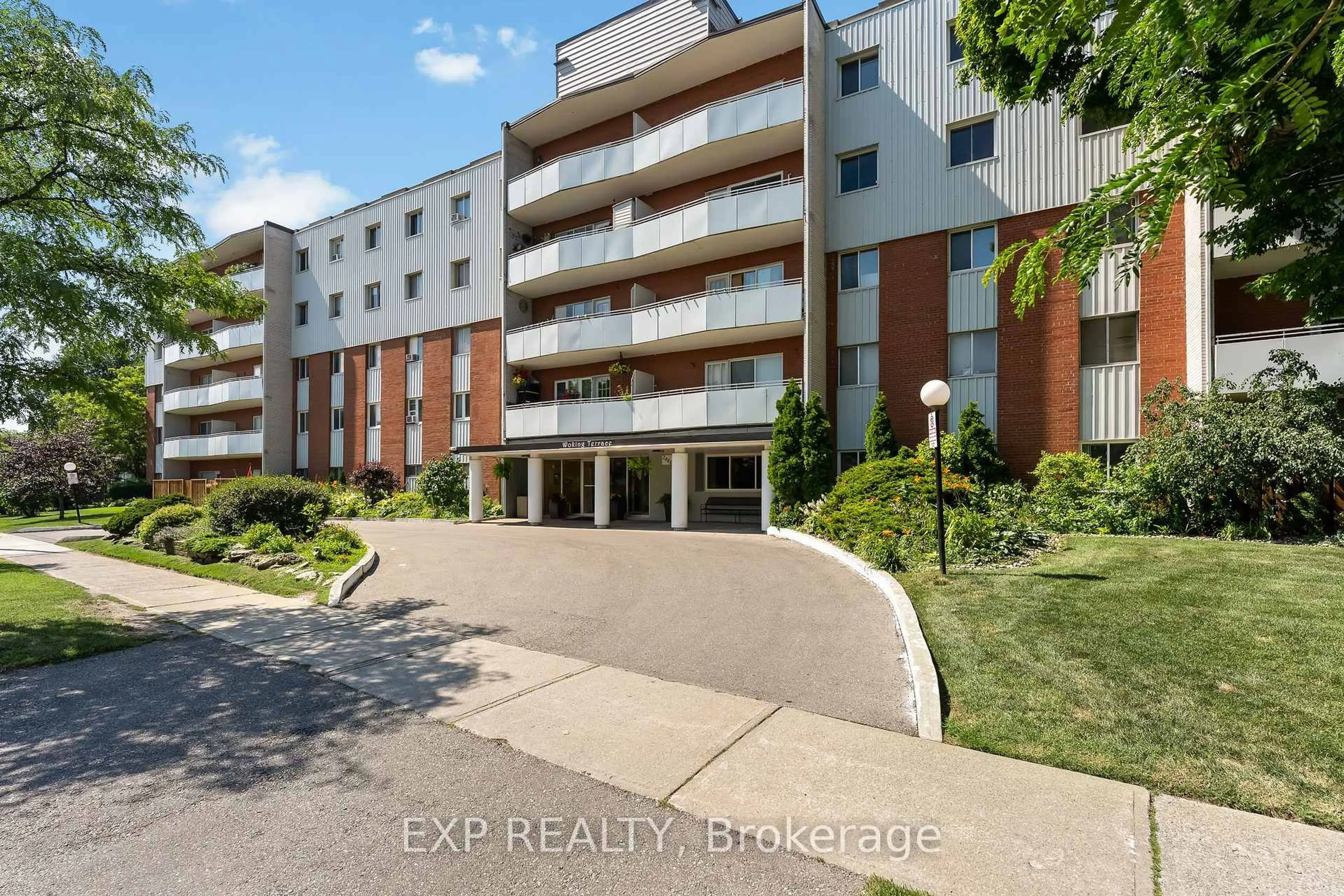A pic from outside/outdoor area/front of a property/back of a property/a pic from drone, street for 2485 Woking Cres #403, Mississauga Ontario L5K 1Z6