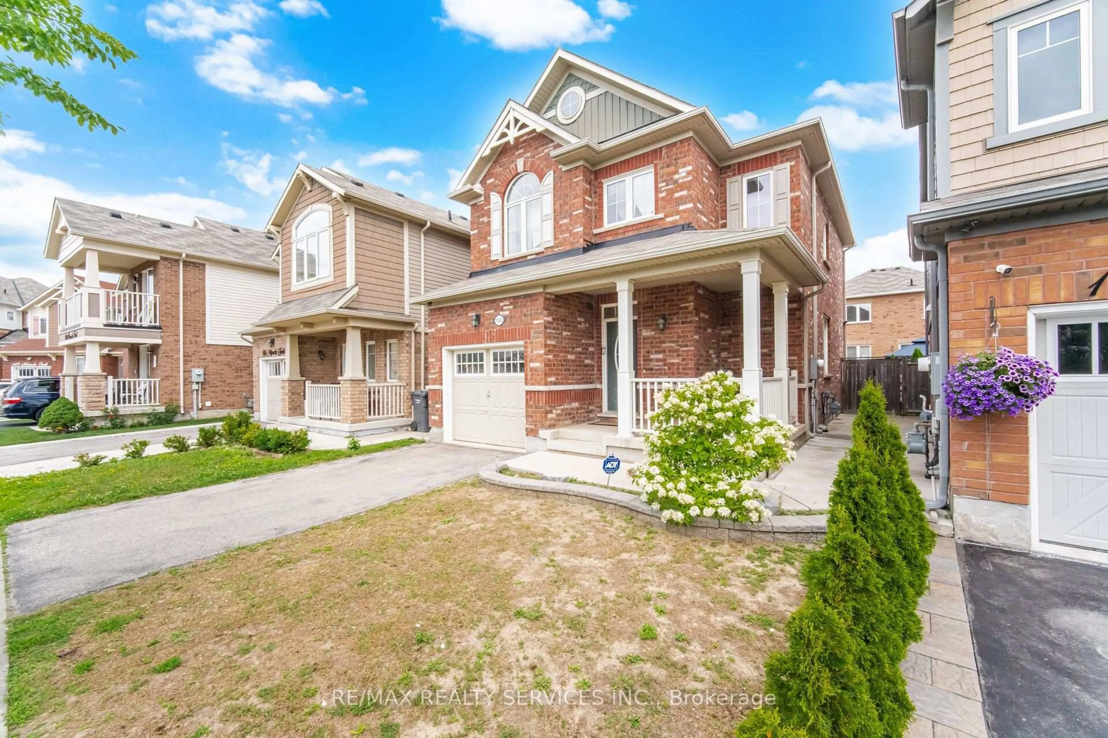 Home with brick exterior material, street for 148 Miracle Tr, Brampton Ontario L7A 0Y9