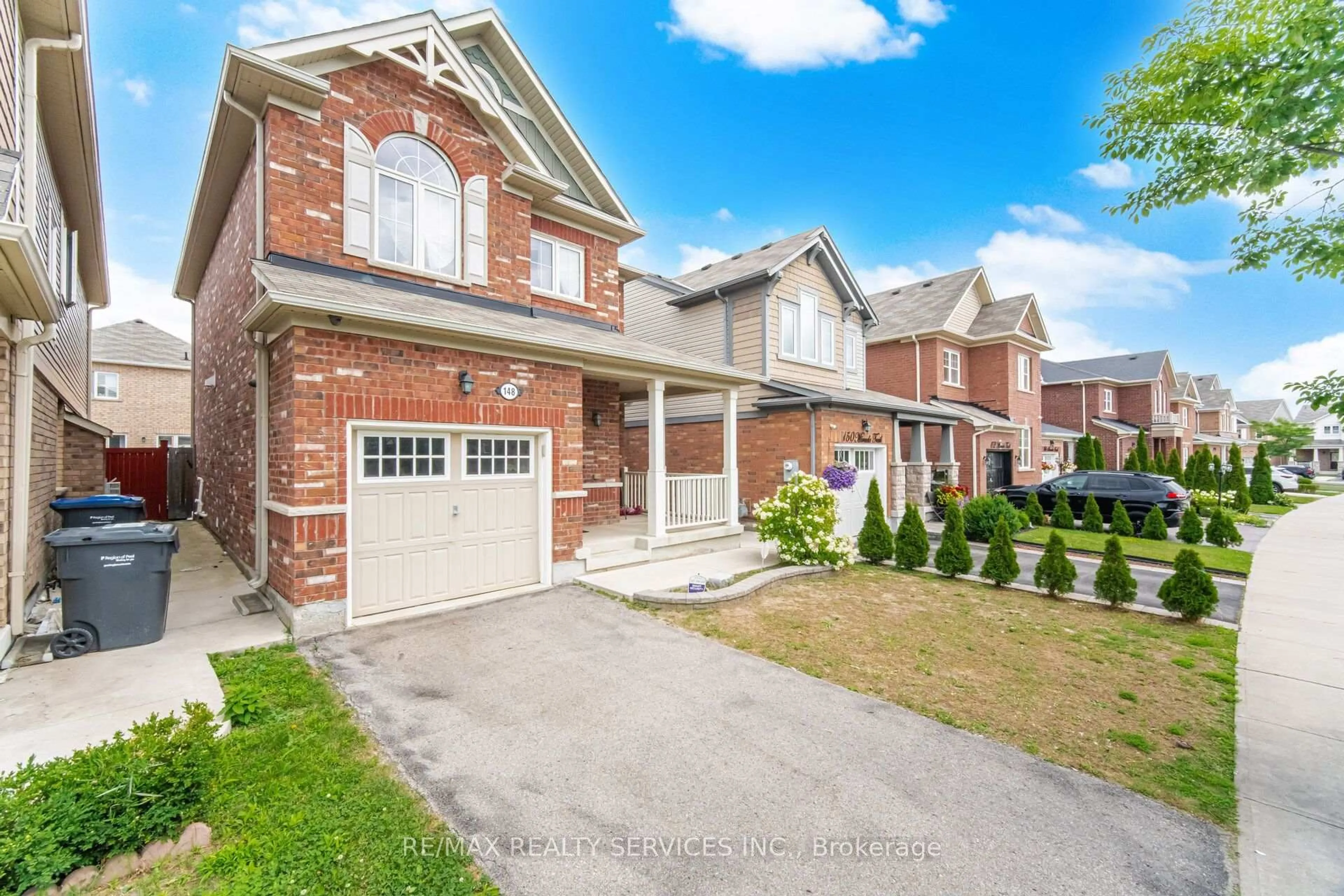 Home with brick exterior material, street for 148 Miracle Tr, Brampton Ontario L7A 0Y9