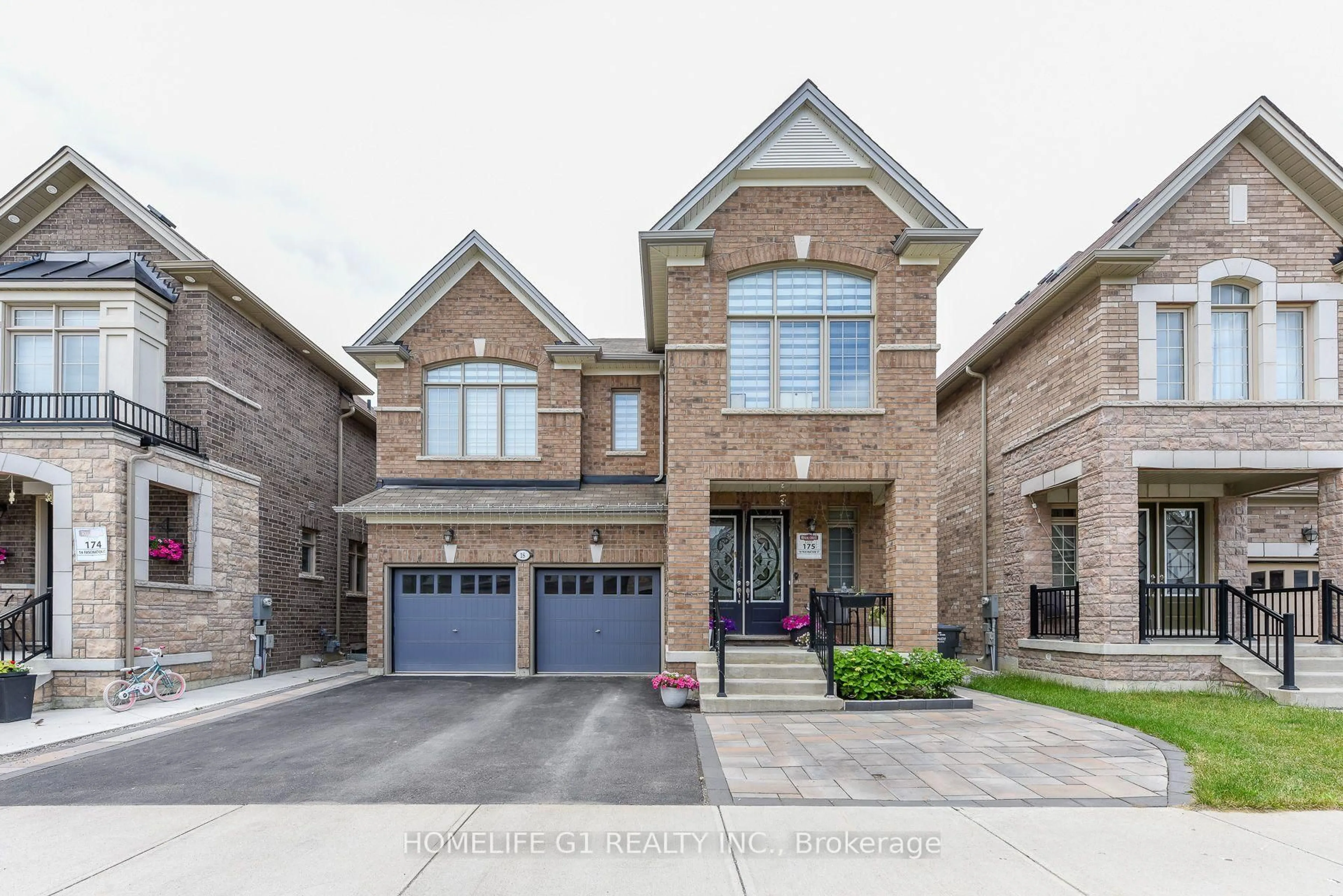 Home with brick exterior material, street for 18 Fascination St, Brampton Ontario L6R 4A9