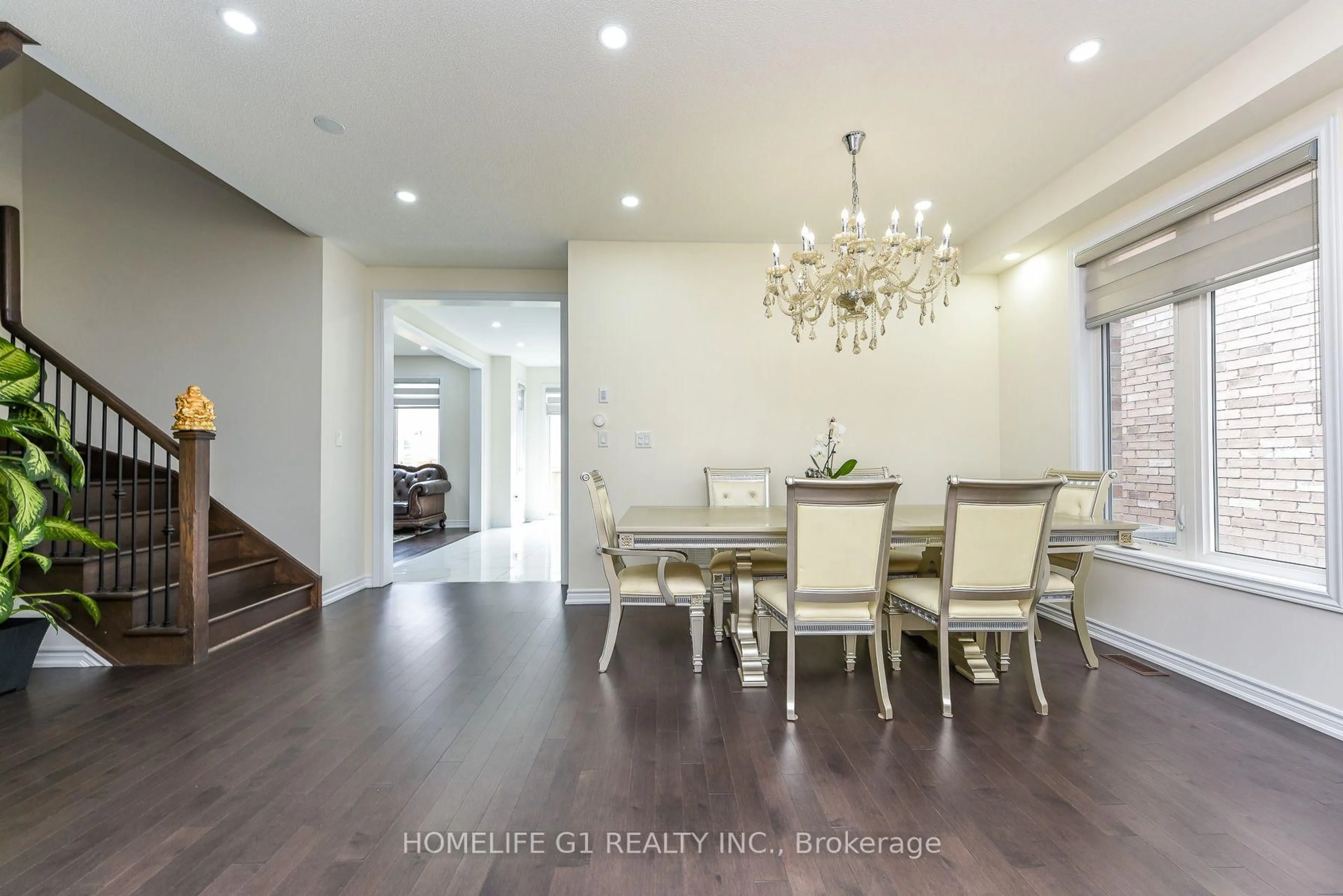 Dining room, wood/laminate floor for 18 Fascination St, Brampton Ontario L6R 4A9