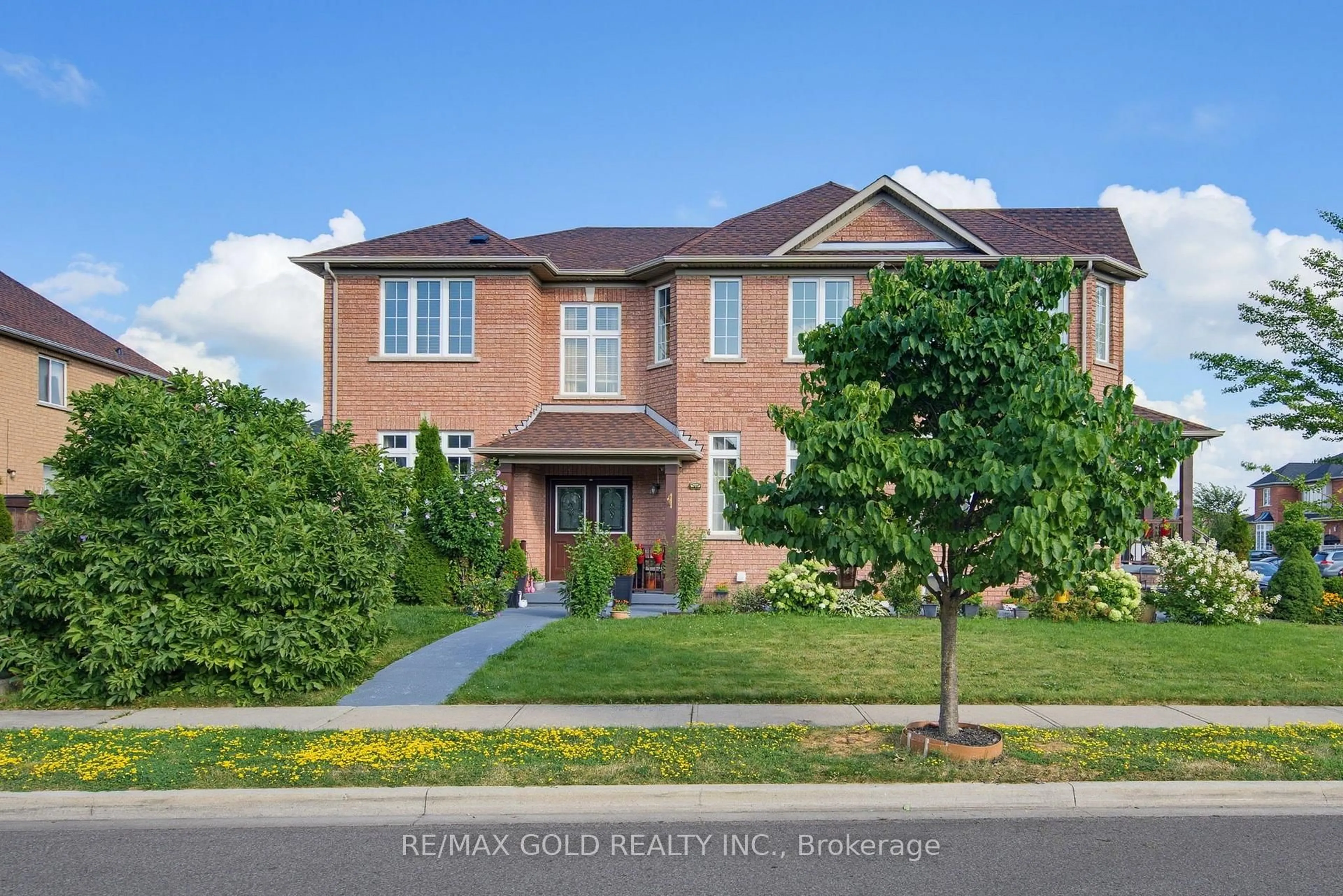 Home with brick exterior material, street for 57 Quailvalley Dr, Brampton Ontario L6R 0N7