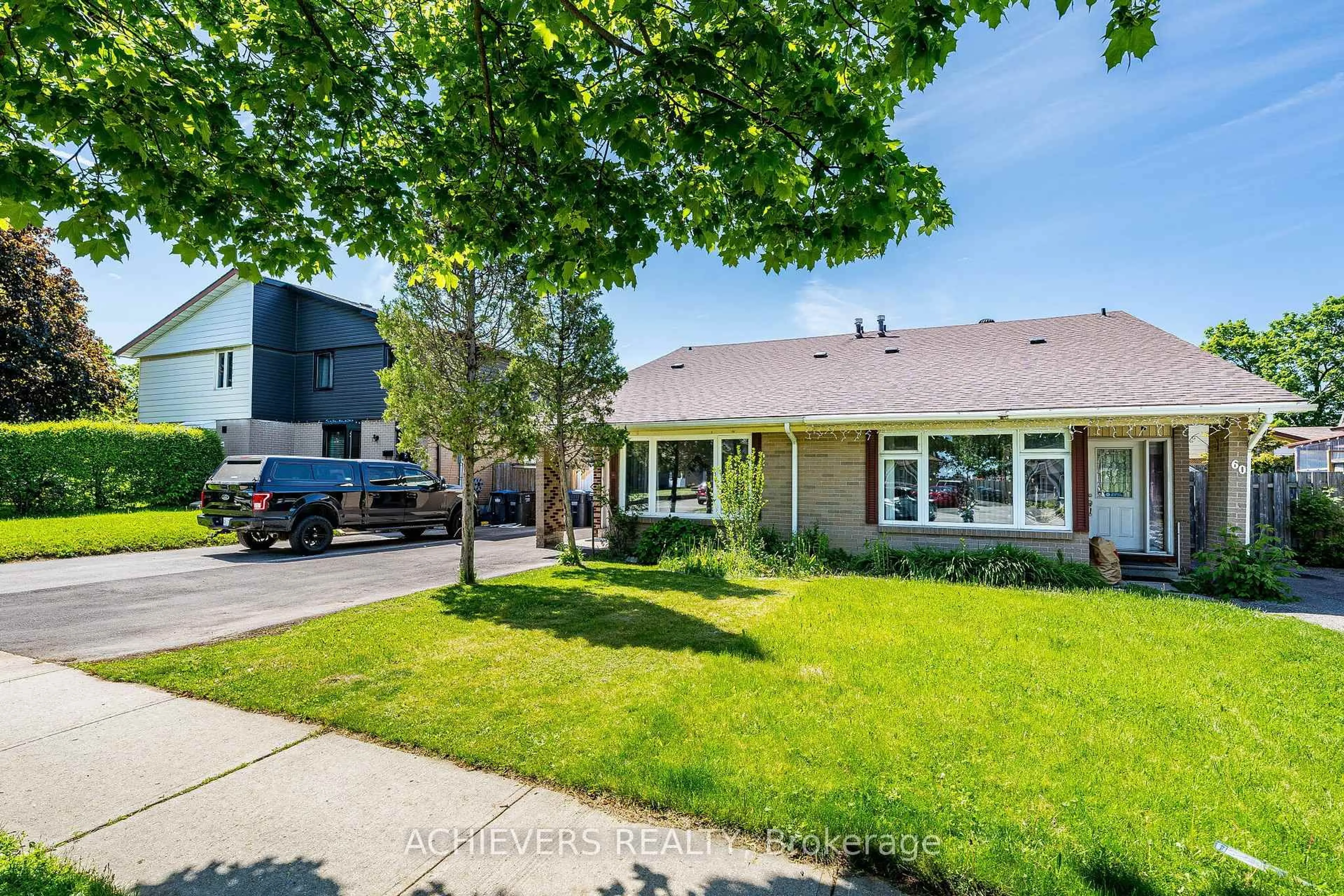 Home with vinyl exterior material, street for 58 Archdekin Dr, Brampton Ontario L6V 1Y5