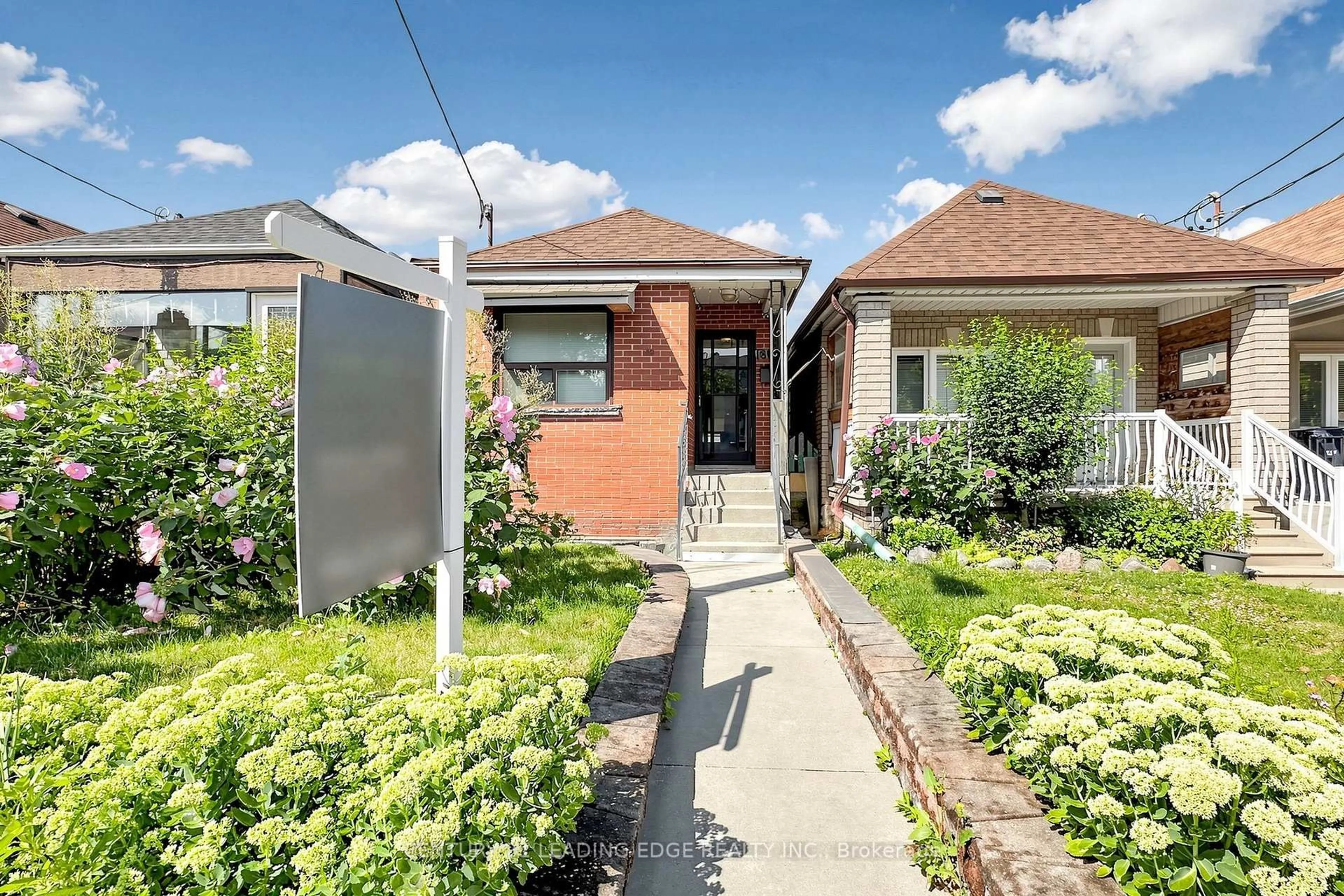 Home with brick exterior material, street for 180 Gilbert Ave, Toronto Ontario M6E 4W5