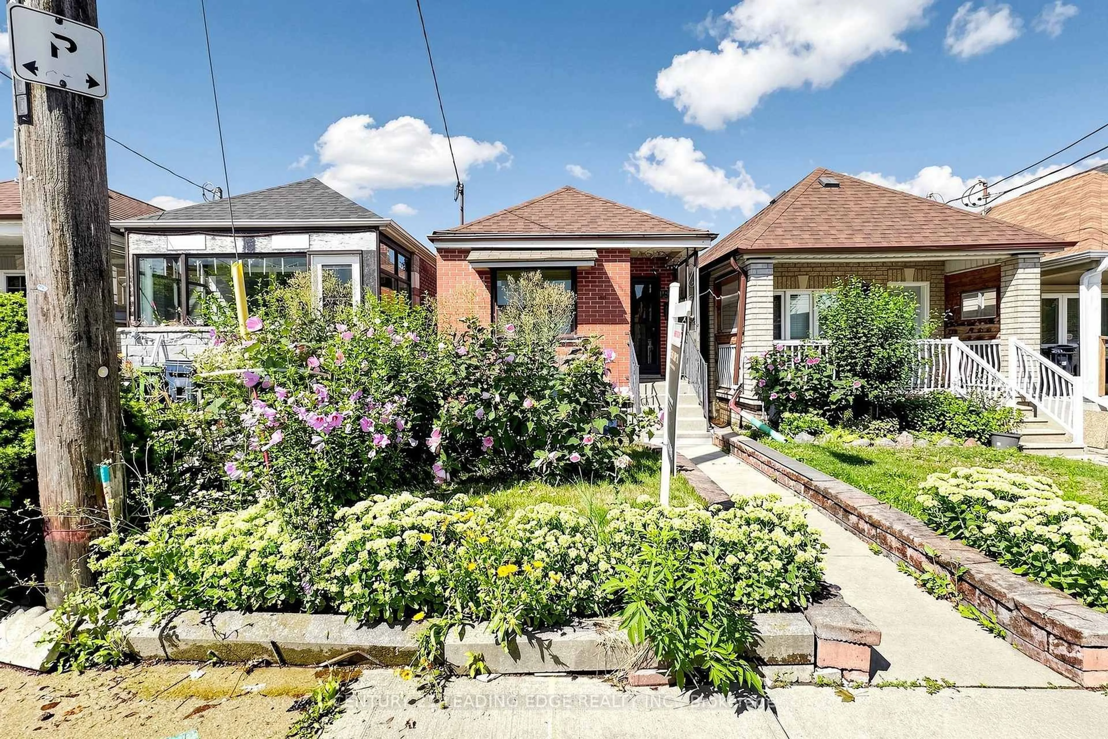 A pic from outside/outdoor area/front of a property/back of a property/a pic from drone, street for 180 Gilbert Ave, Toronto Ontario M6E 4W5
