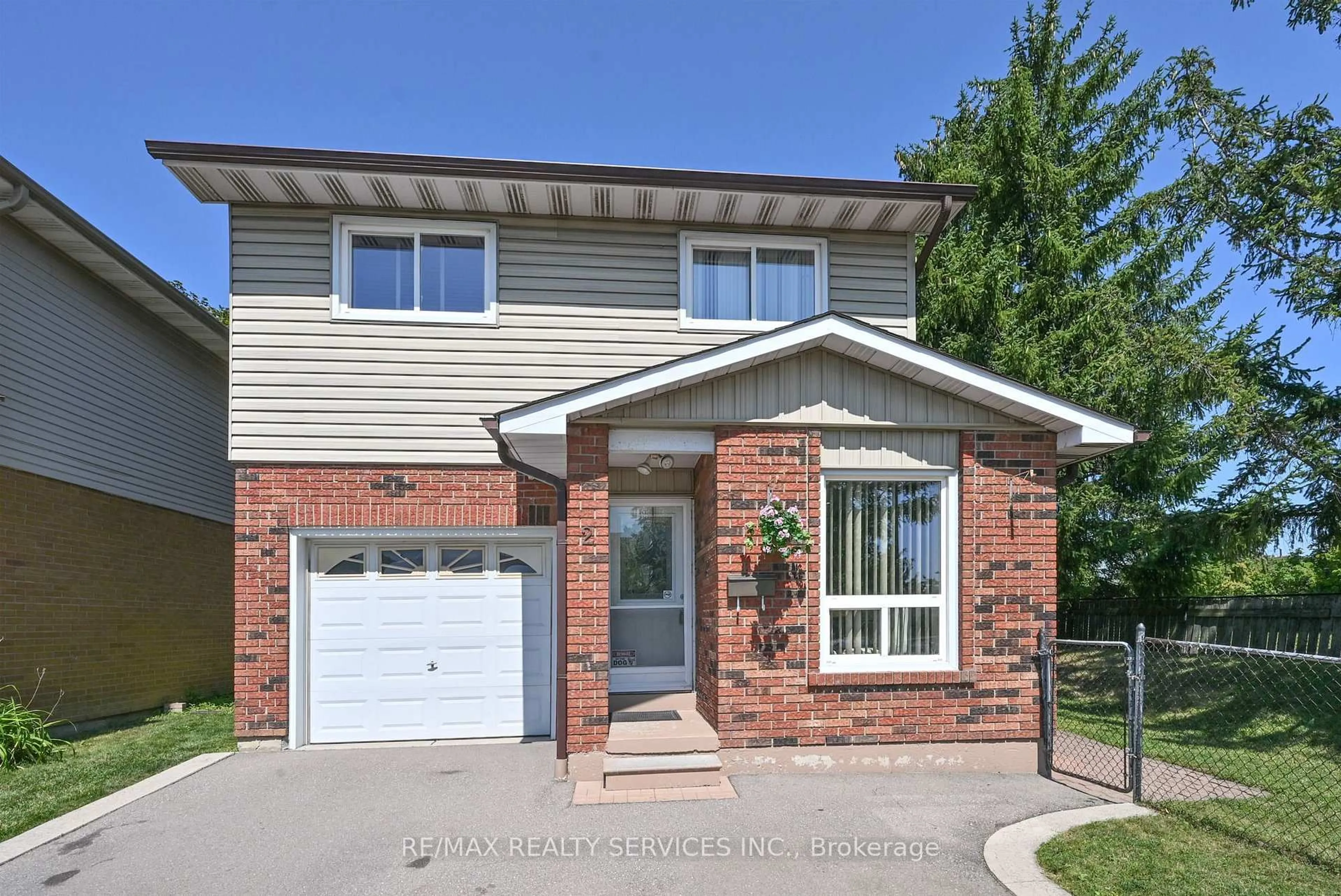 Home with brick exterior material, street for 2 Lindridge Ave, Brampton Ontario L6S 3W9