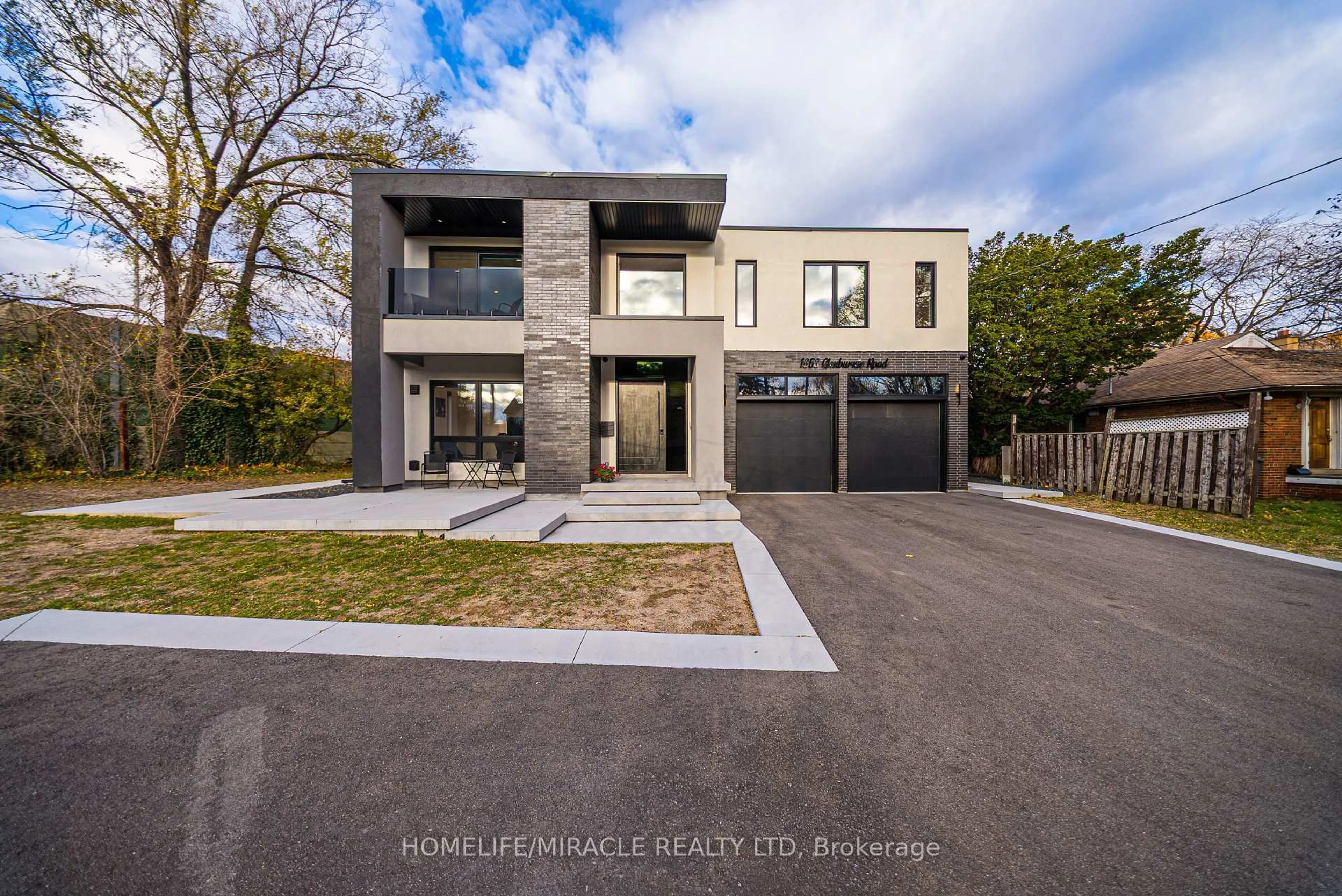 Home with brick exterior material, street for 1653 Glenburnie Rd, Mississauga Ontario L5G 3E4