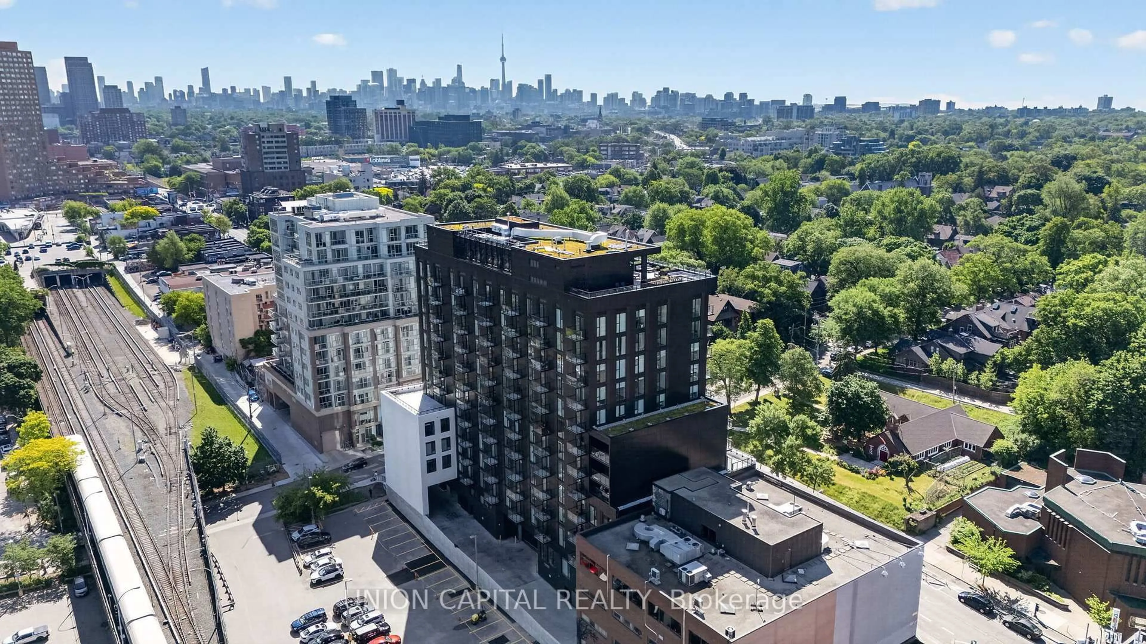 A pic from outside/outdoor area/front of a property/back of a property/a pic from drone, city buildings view from balcony for 1660 Bloor St #910, Toronto Ontario M6P 0C6