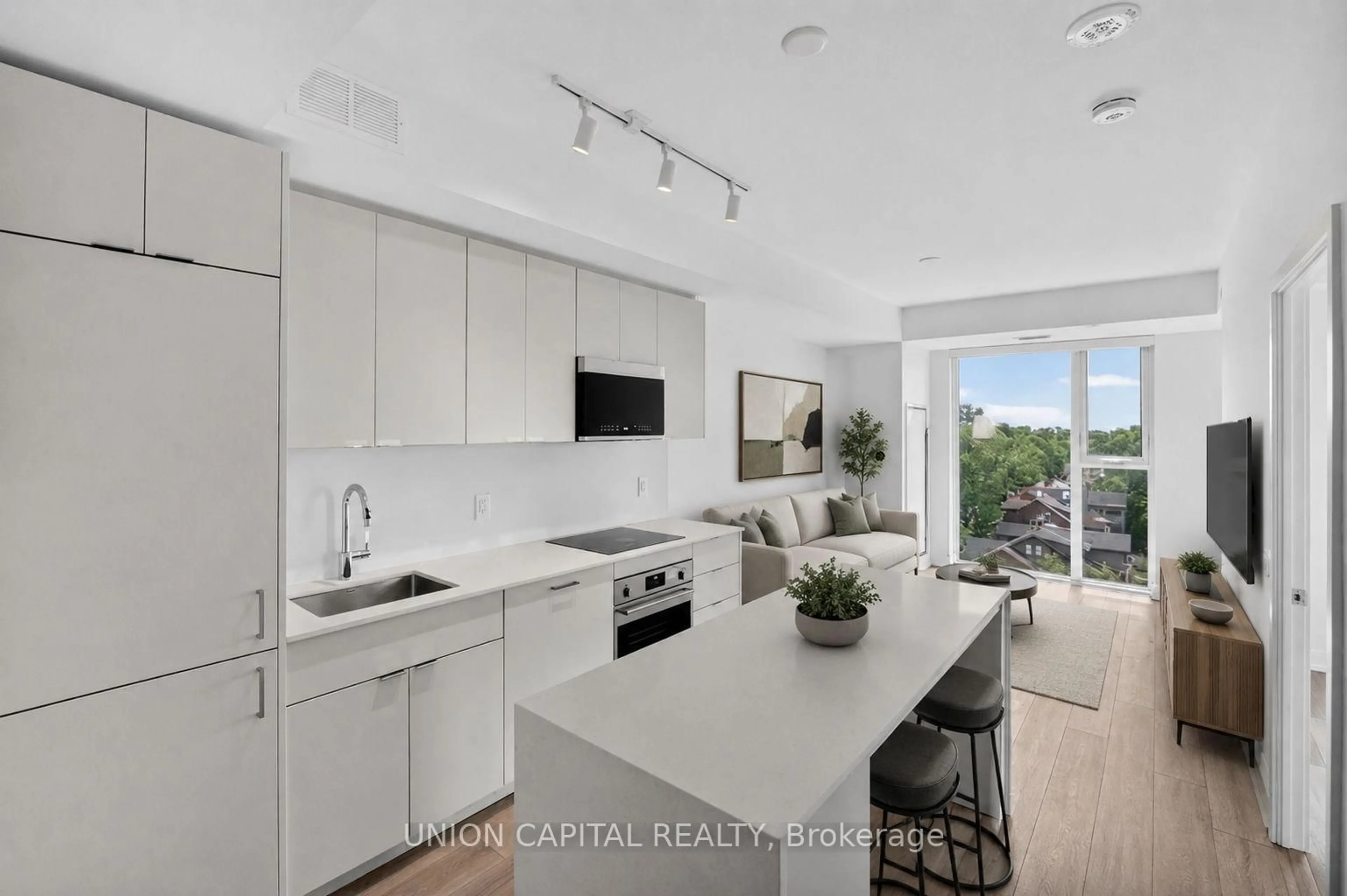Open concept kitchen, ceramic/tile floor for 1660 Bloor St #910, Toronto Ontario M6P 0C6