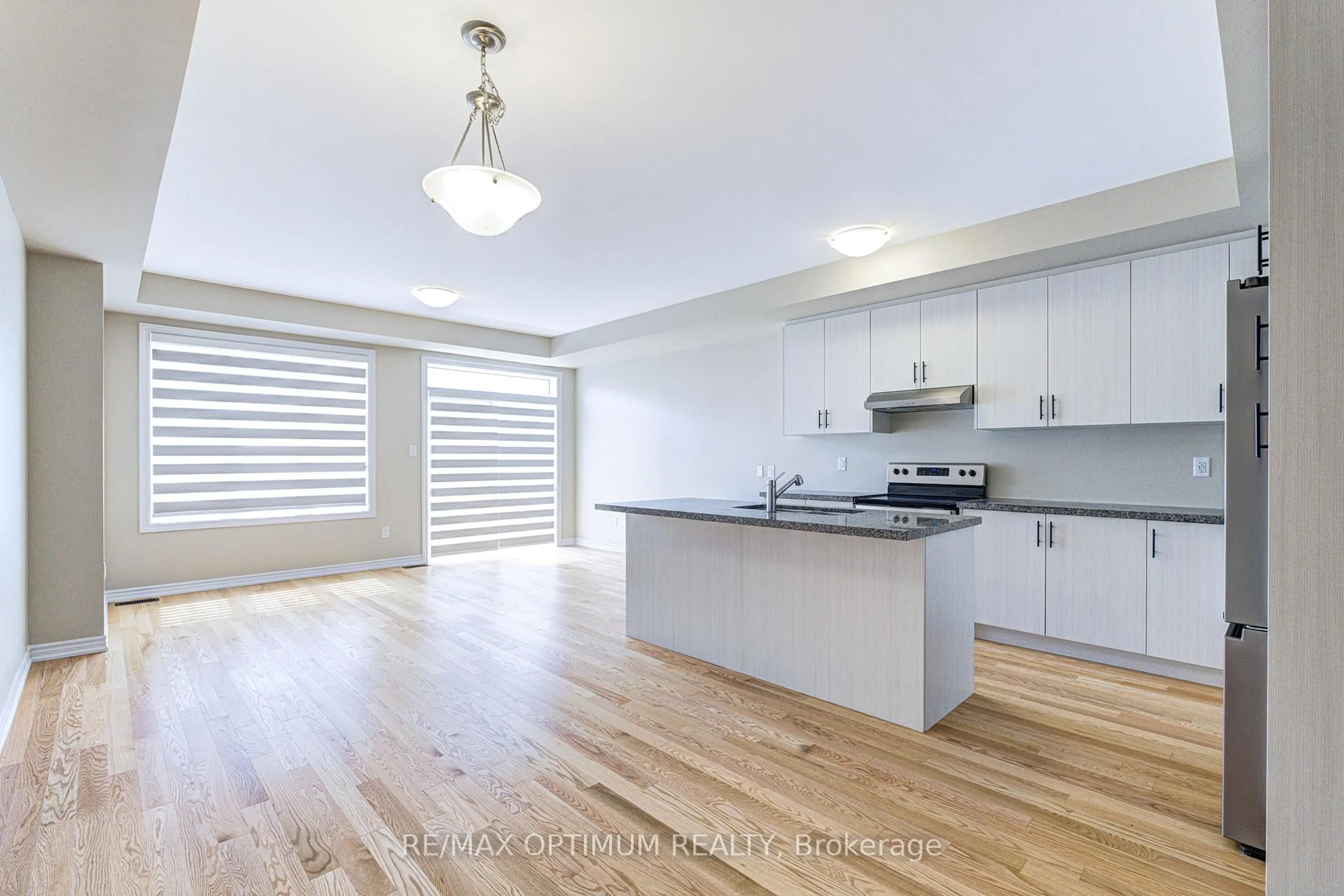 Open concept kitchen, wood/laminate floor for 1420 Oakmont Common, Burlington Ontario L7P 0V8