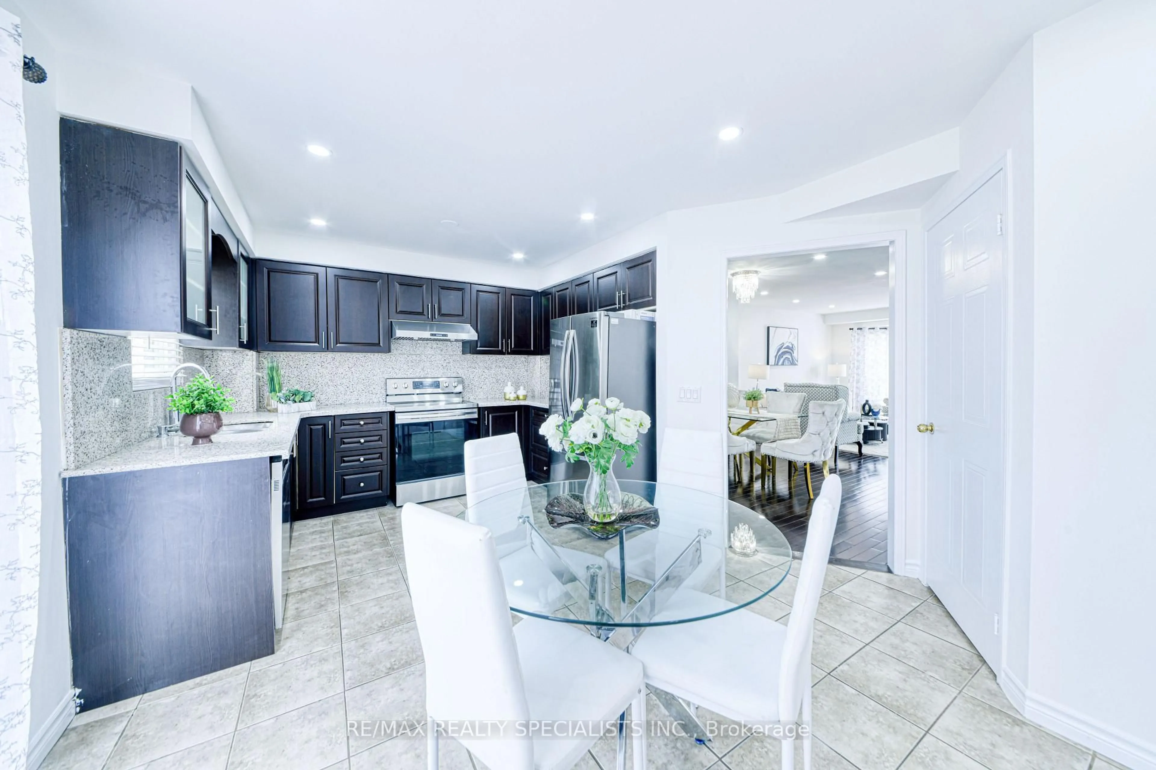 Open concept kitchen, ceramic/tile floor for 35 Softneedle Ave, Brampton Ontario L6R 1K4