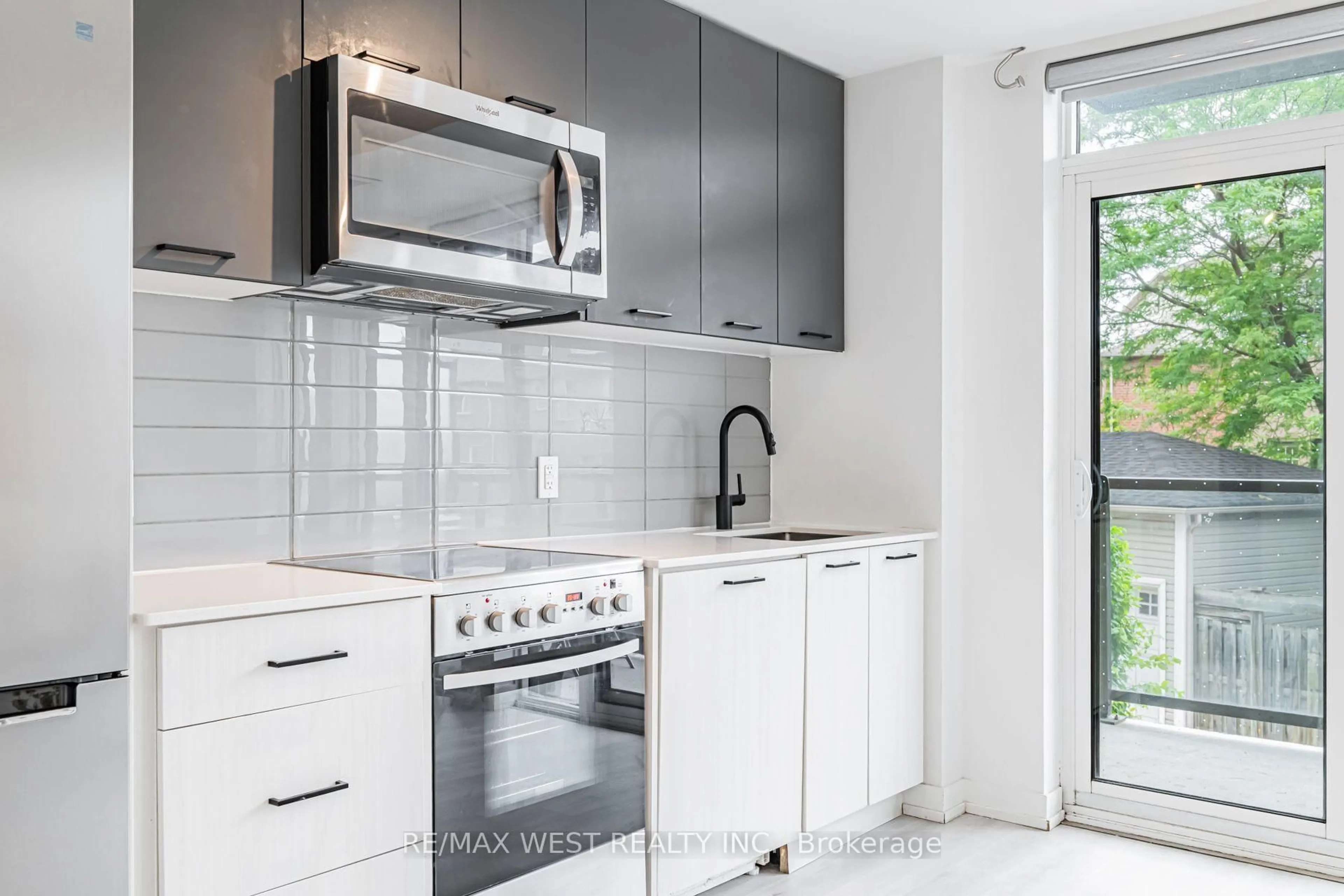 Standard kitchen, ceramic/tile floor for 2300 St Clair Ave #211, Toronto Ontario M6N 0B3